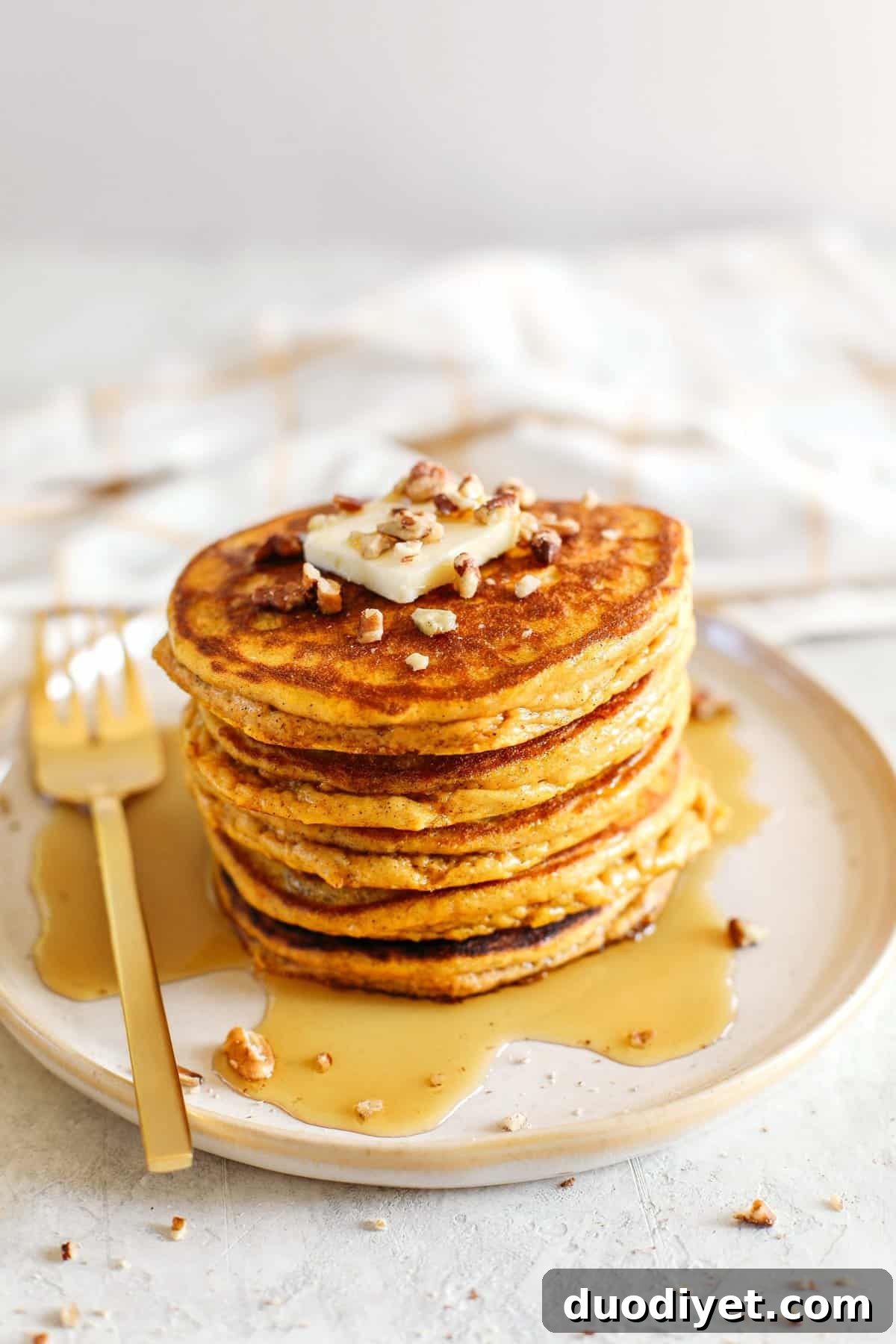 Fluffy Pumpkin Pancakes Recipe with Warm Spices 2 Start your morning with these fluffy pumpkin pancakes that are gluten-free, dairy-free and paleo with zero refined sugars made with almond flour for an easy delicious fall breakfast!