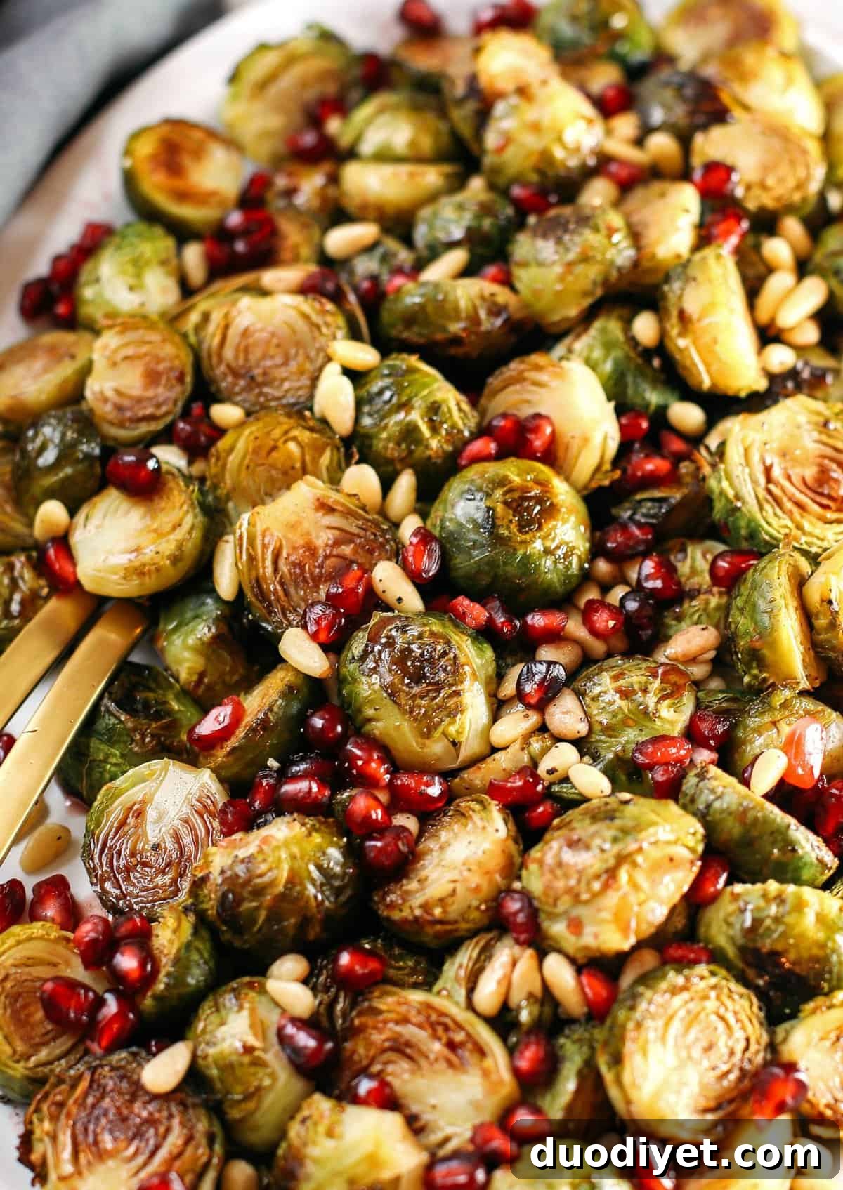 These Pomegranate Glazed Brussels Sprouts are savory, sweet and roasted to perfection making them the perfect holiday side dish for your table this season!