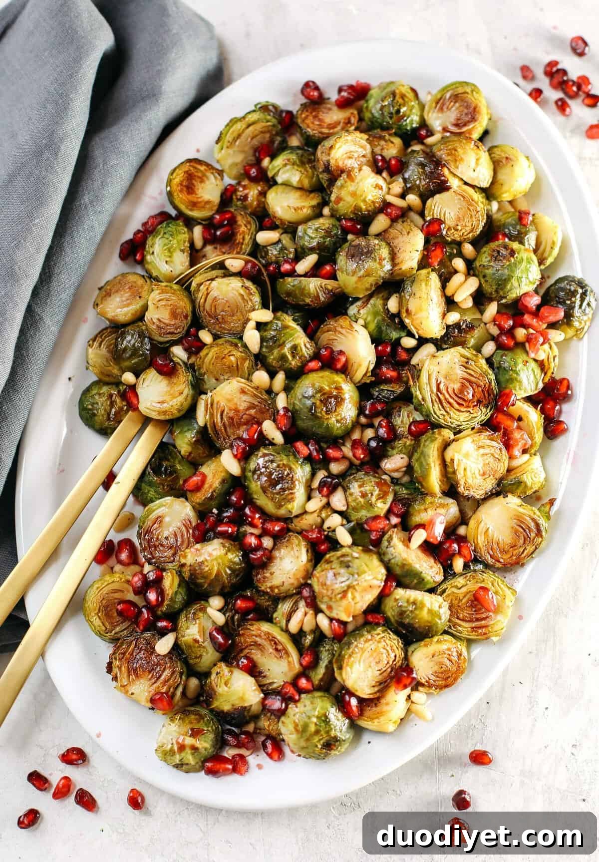 These Pomegranate Glazed Brussels Sprouts are savory, sweet and roasted to perfection making them the perfect holiday side dish for your table this season!