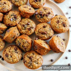 Moist Banana Zucchini Muffins with Chocolate Chips 7 Healthy bite-sized Chocolate Chip Banana Zucchini Muffins that are moist and delicious with hidden veggies and naturally sweetened with banana and honey!
