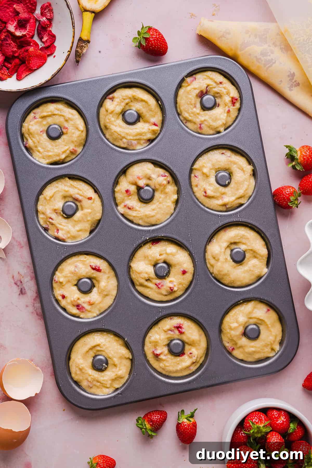Glazed strawberry banana donuts