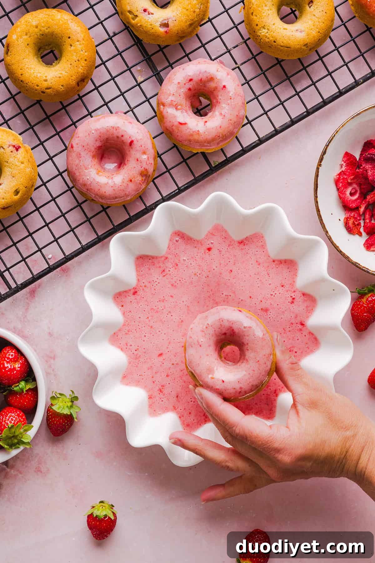 Tray of strawberry banana donuts cooling