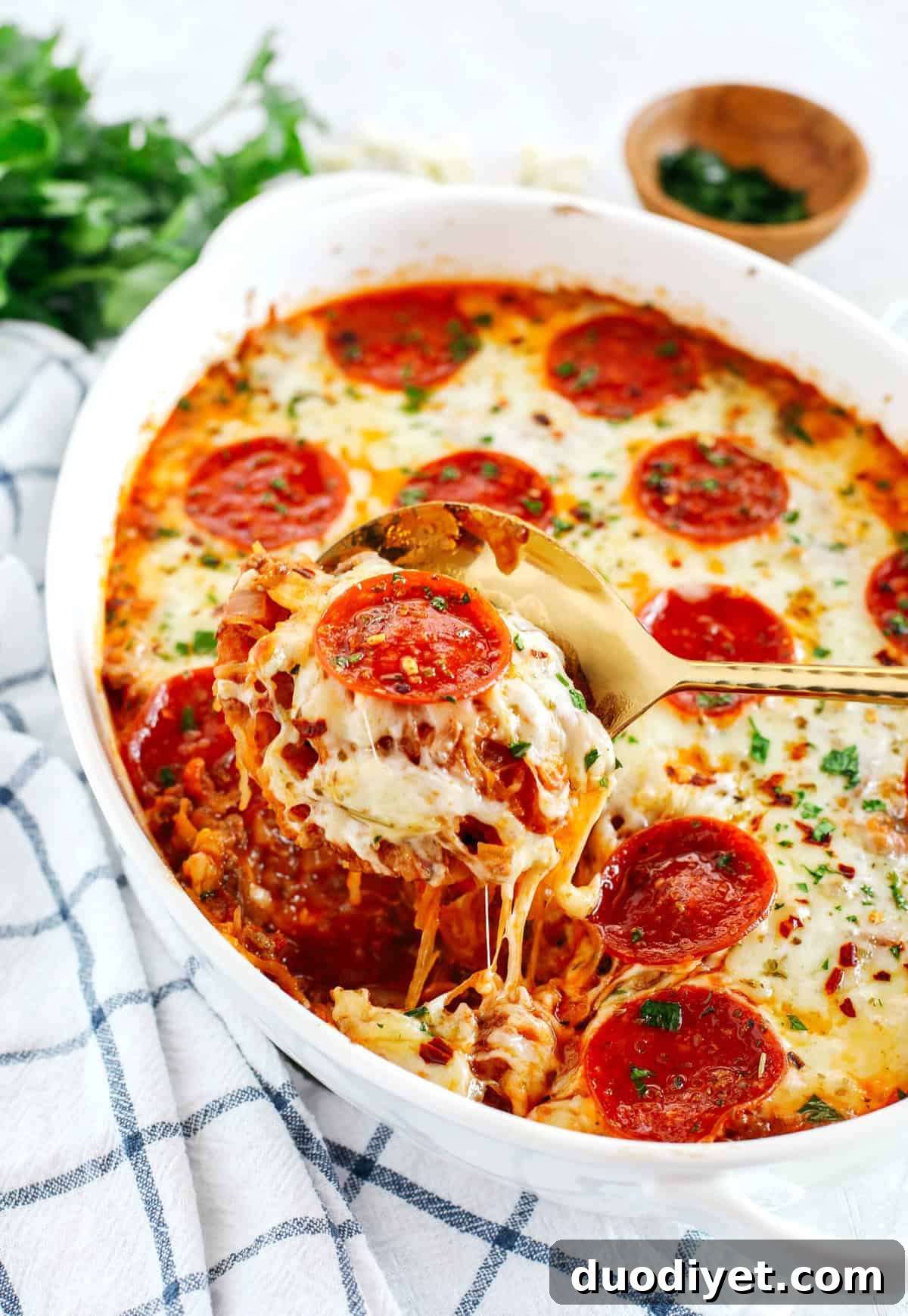 Low-Carb Cheesy Spaghetti Squash Pizza Casserole 2 This Spaghetti Squash Pizza Casserole is the perfect low carb comfort food that is delicious, super filling and made with seasoned ground beef, melty cheese and your favorite marinara!