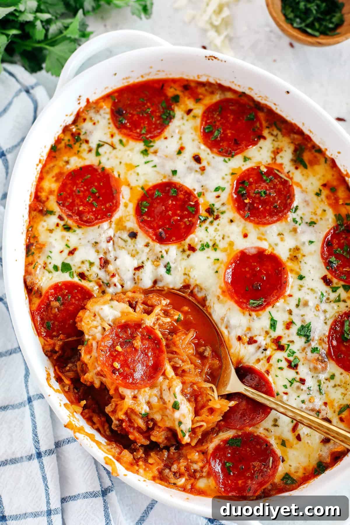 Low-Carb Cheesy Spaghetti Squash Pizza Casserole 3 This Spaghetti Squash Pizza Casserole is the perfect low carb comfort food that is delicious, super filling and made with seasoned ground beef, melty cheese and your favorite marinara!