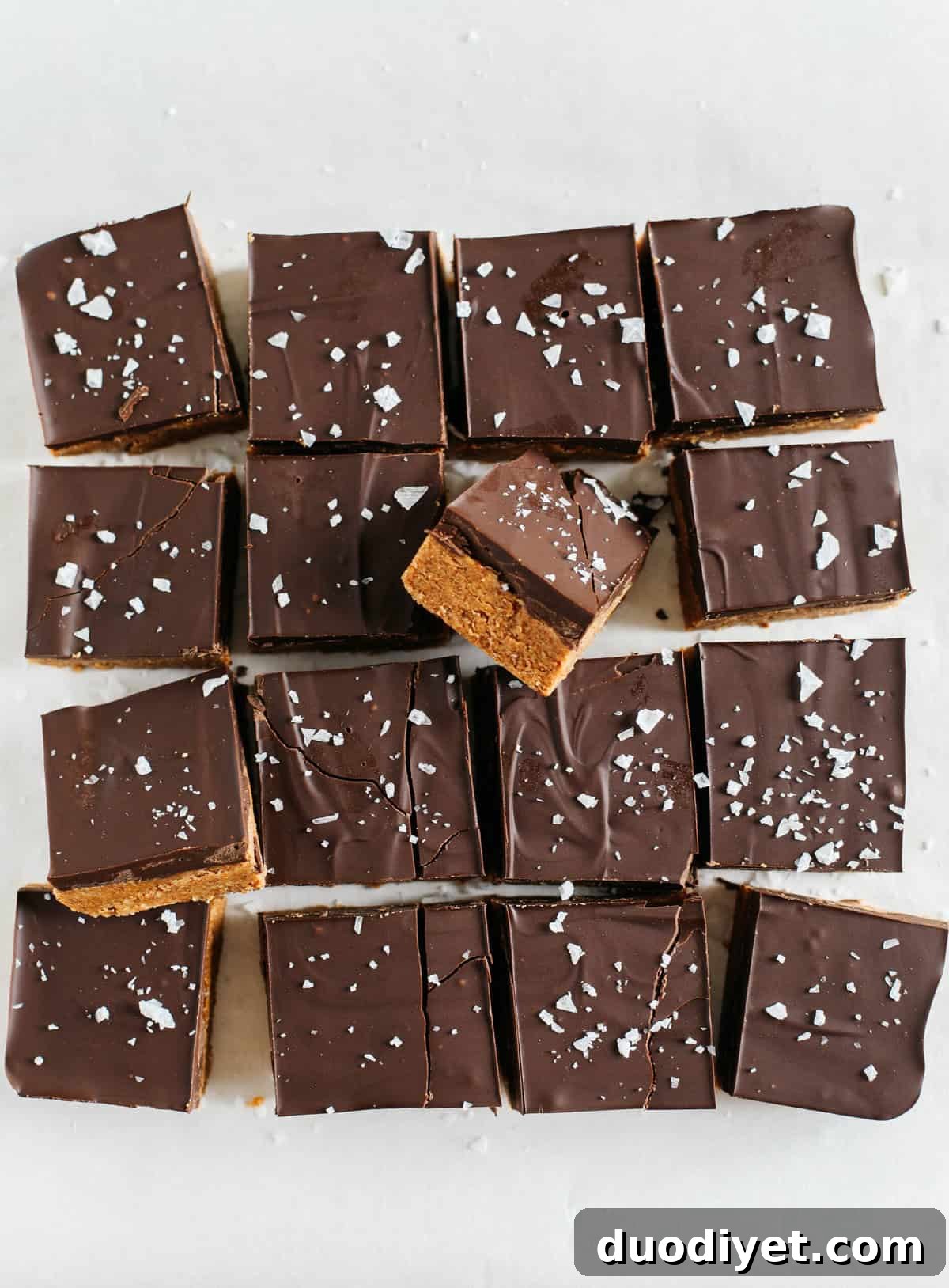 These Dark Chocolate Almond Butter Bars are rich, fudgy and make the perfect sweet treat with just a few simple ingredients and zero baking required!