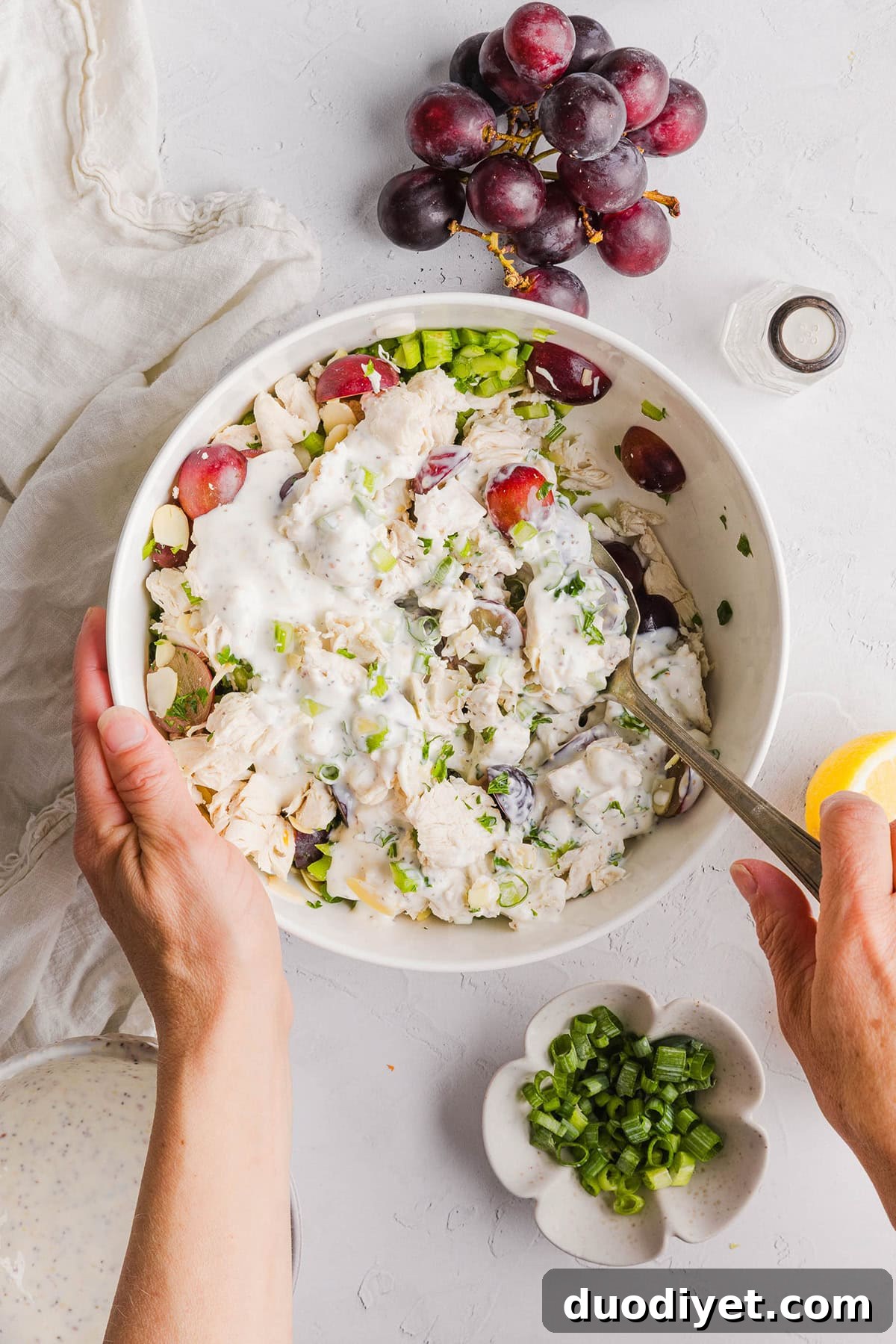This Healthy Chicken Salad is creamy, fresh and packed with protein! Made with tender chicken, Greek yogurt in place of mayo, crunchy celery, grapes, and sliced almonds for a delicious, easy lunch or meal prep option you'll make on repeat!