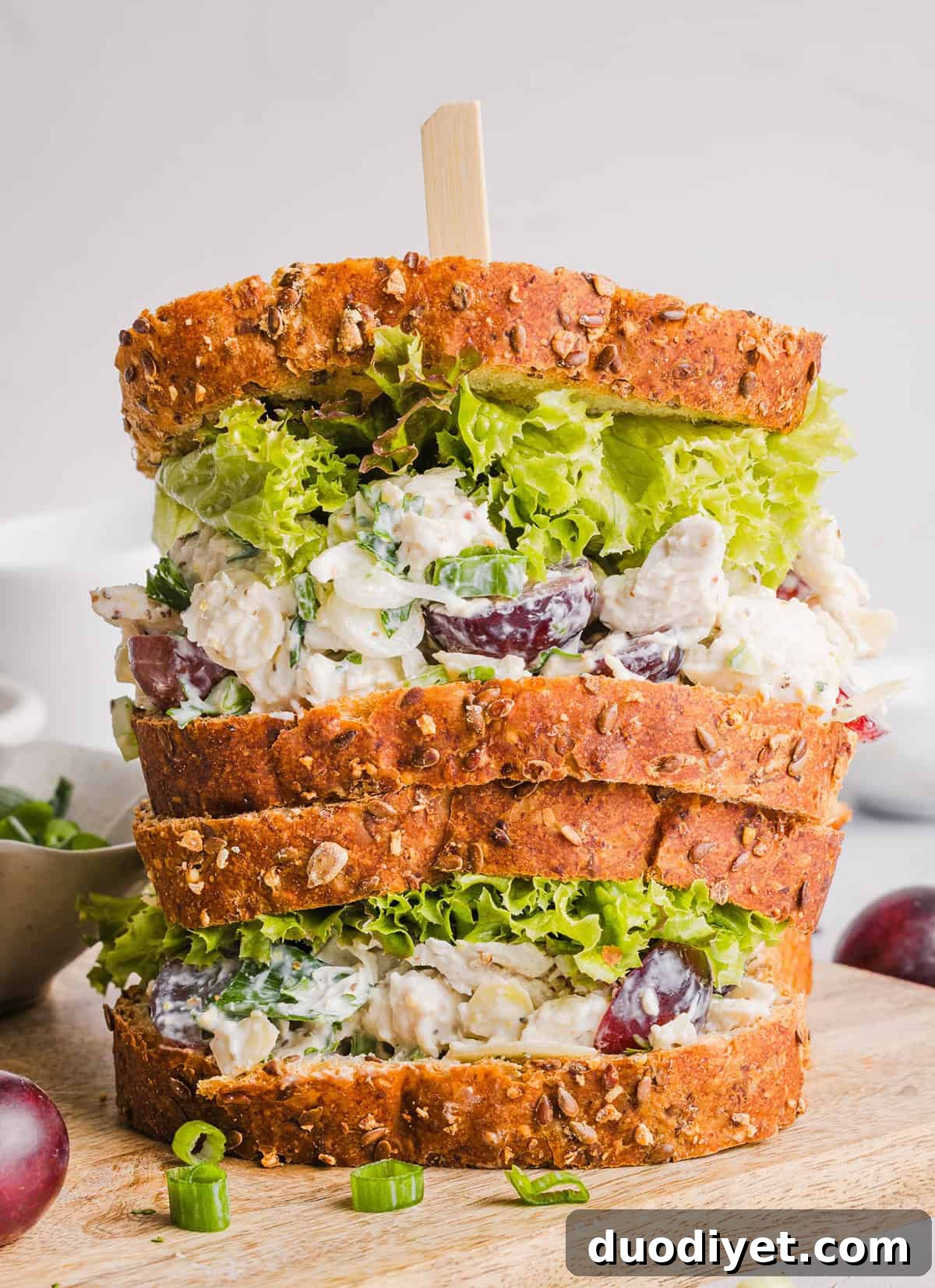 This Healthy Chicken Salad is creamy, fresh and packed with protein! Made with tender chicken, Greek yogurt in place of mayo, crunchy celery, grapes, and sliced almonds for a delicious, easy lunch or meal prep option you'll make on repeat!