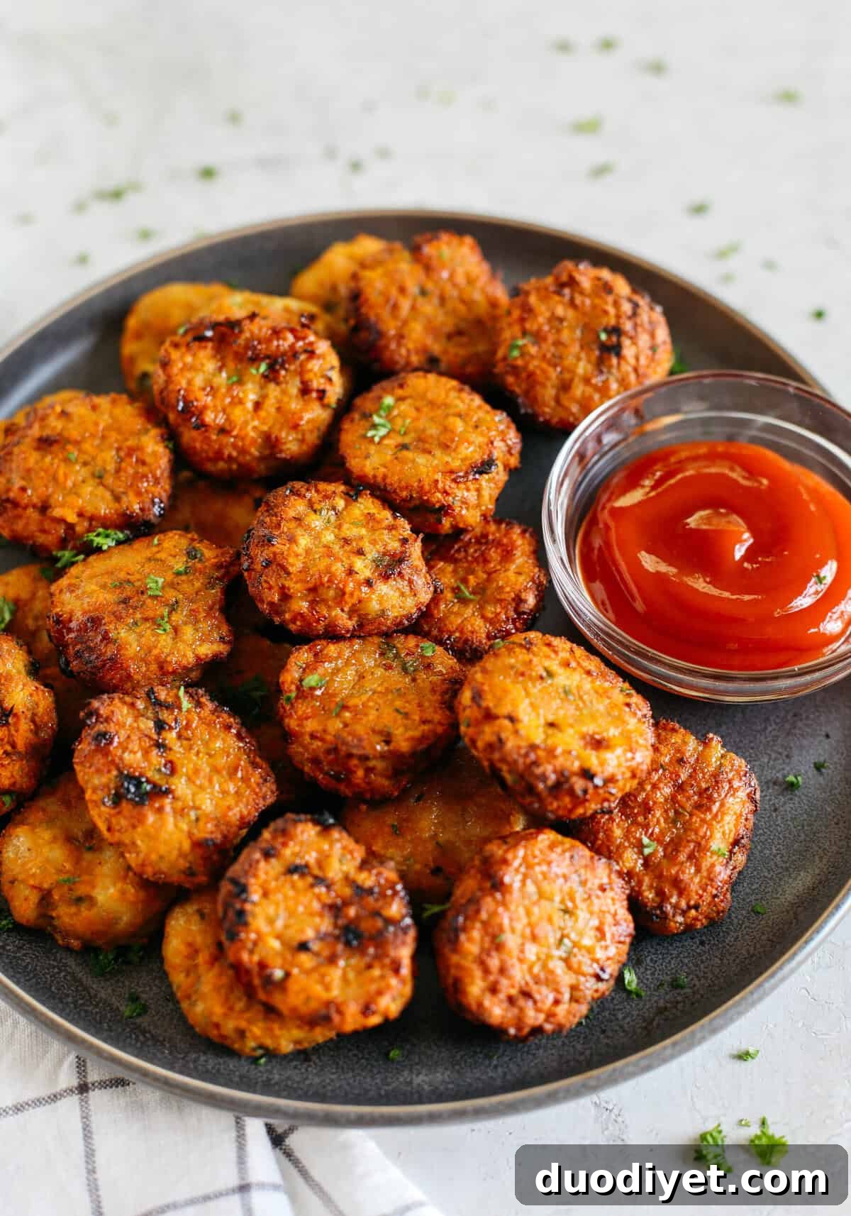 These bite-sized Sweet Potato Chicken Bites are flavorful, delicious and made right in the air fryer for a perfectly crispy (and healthy!) alternative to chicken nuggets!