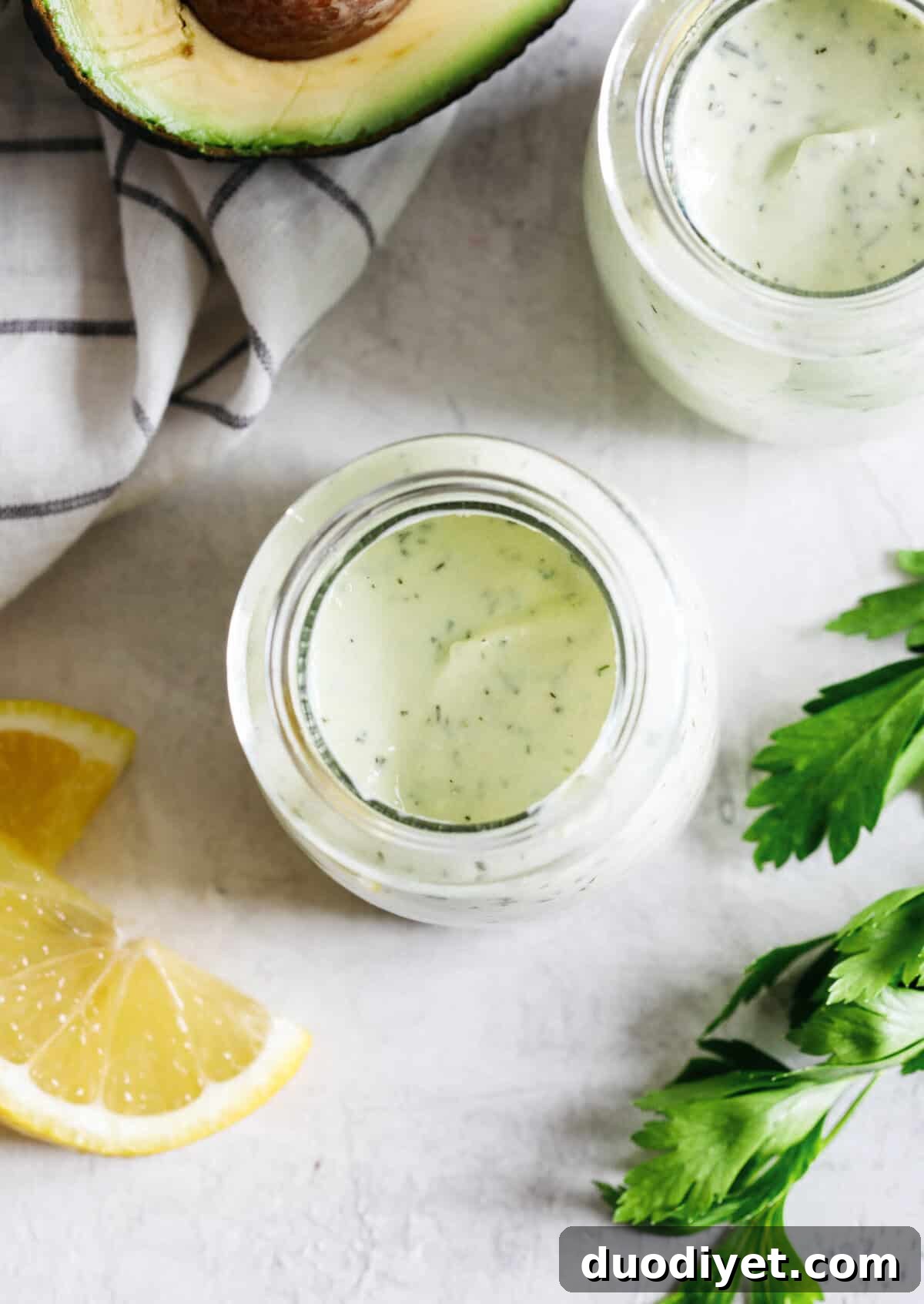 Creamy Avocado Ranch Dressing made healthier with Greek yogurt easily made in just 5 minutes with so much delicious flavor!  Perfect for salads and dips for veggies!