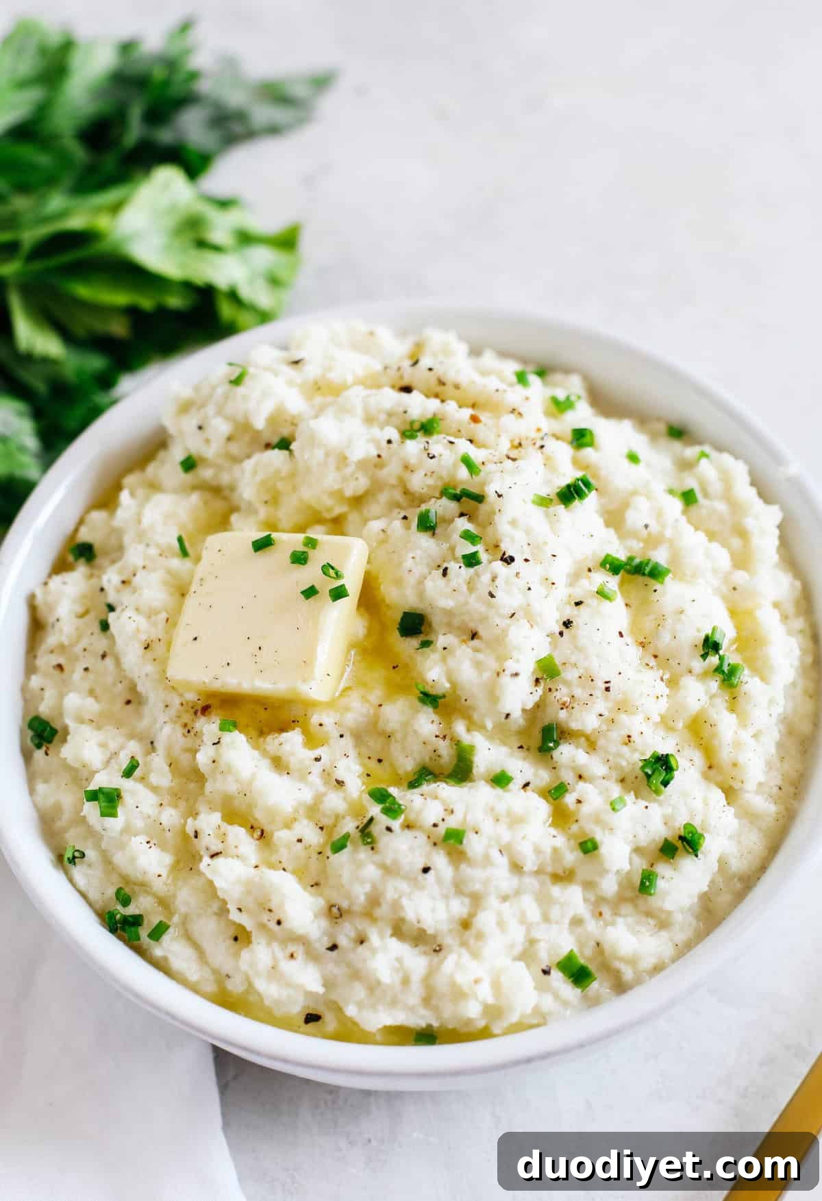 Finished mashed cauliflower in a bowl