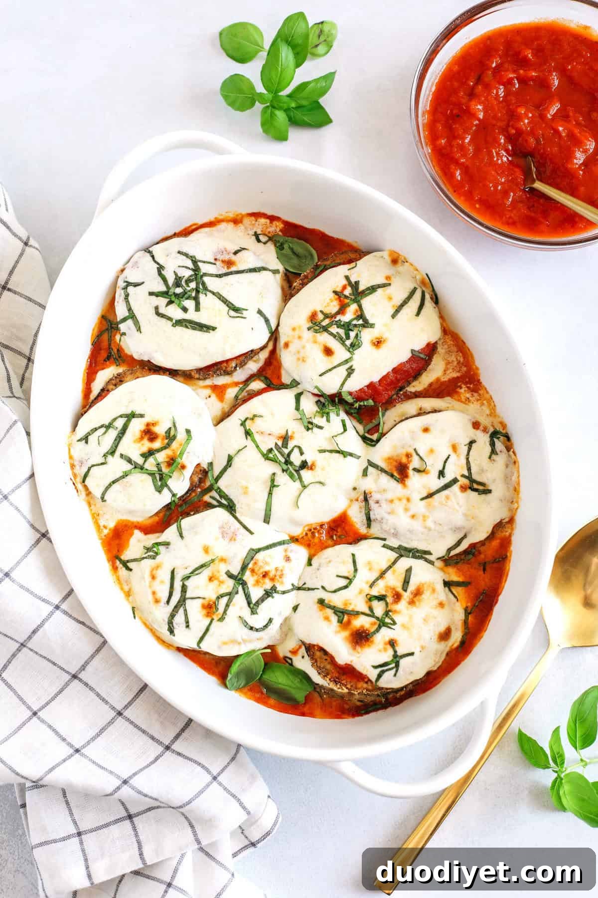Crispy Air Fryer Eggplant Parmesan Recipe 3 Air fried crispy eggplant layered with melty cheese and marinara for the perfect low carb comfort food you can easily make any night of the week!