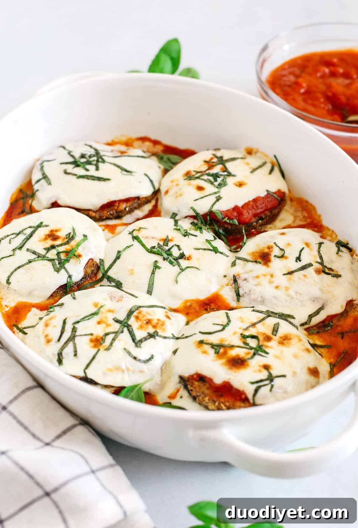 Crispy Air Fryer Eggplant Parmesan Recipe 5 Air fried crispy eggplant coated in almond flour and layered with melty cheese and marinara for the perfect low carb comfort food you can easily make any night of the week!