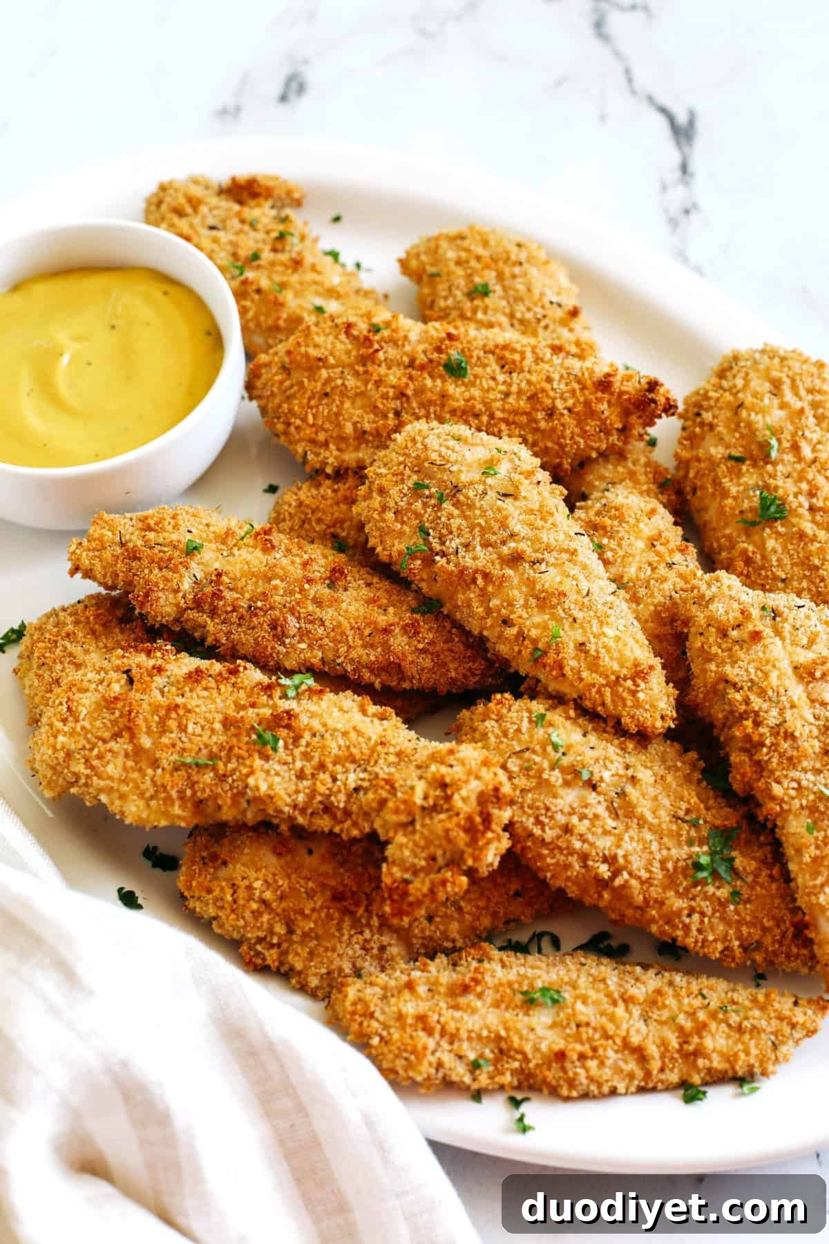 Crispy Oven-Baked Chicken Tenders 5 Baked chicken tenders with sides