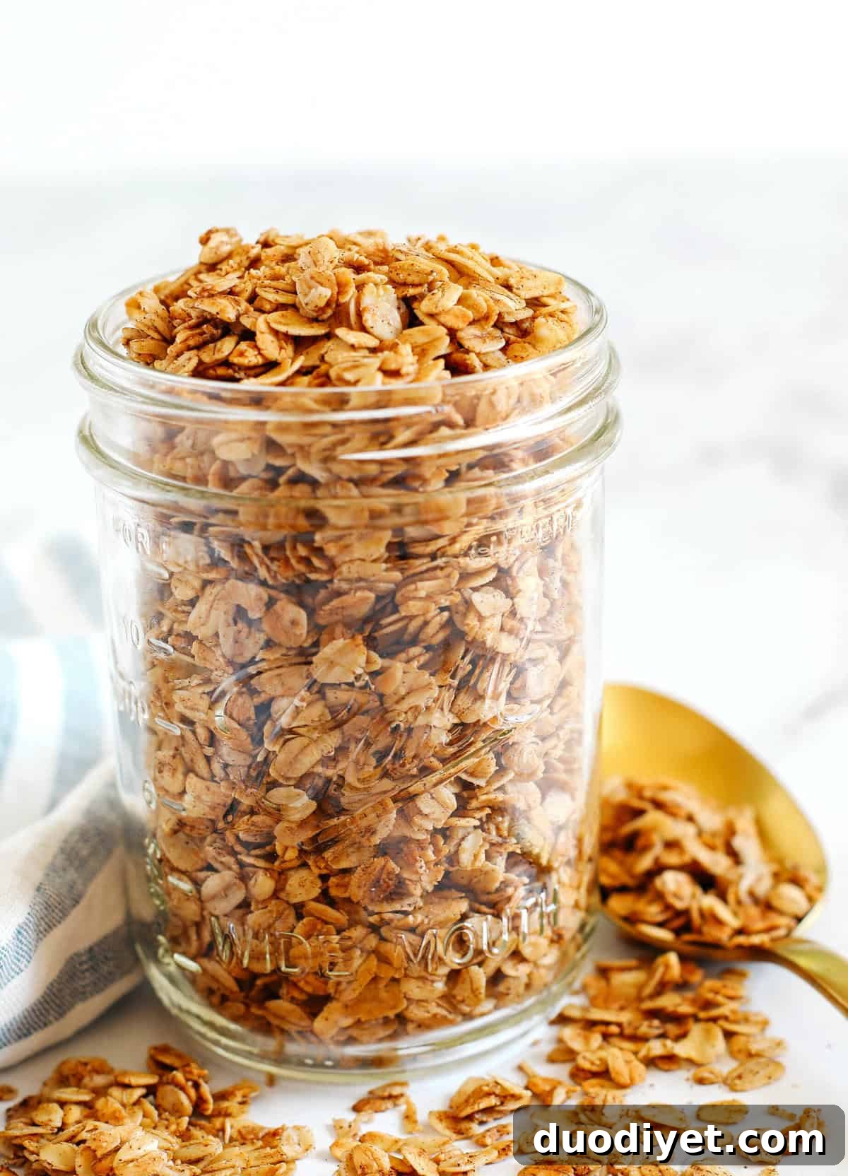 Crunchy Maple Cinnamon Granola Recipe 3 Baked granola on a sheet pan