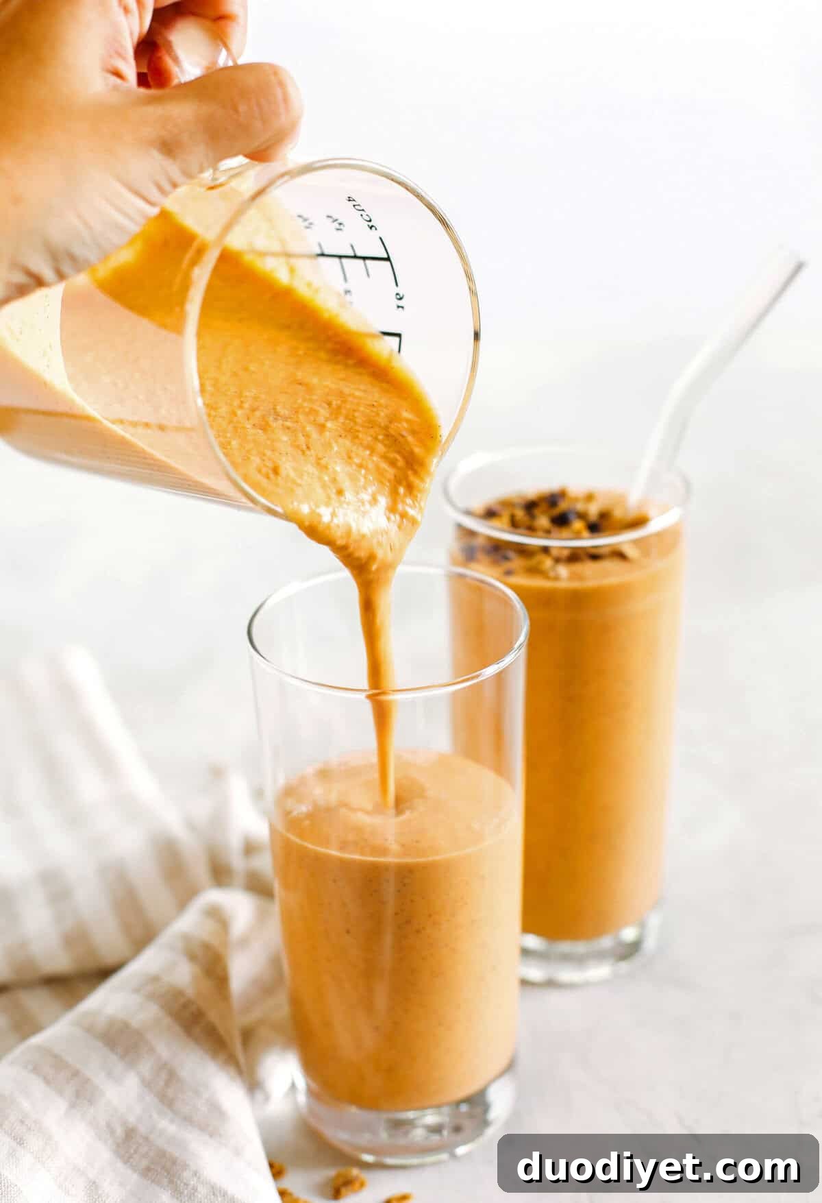 Start your morning off with this thick and creamy Pumpkin Spice Smoothie that is healthy, delicious and loaded with all your fall favorites like pumpkin, apple, banana, Greek yogurt, maple syrup and warm spices!