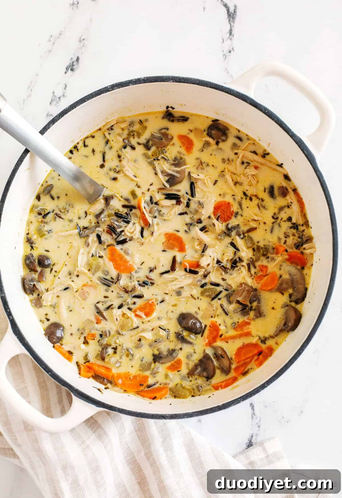 Creamy Chicken and Wild Rice Soup that is delicious, loaded with veggies and makes the perfect cozy meal that can easily made in your instant pot, slow cooker or right on the stove!