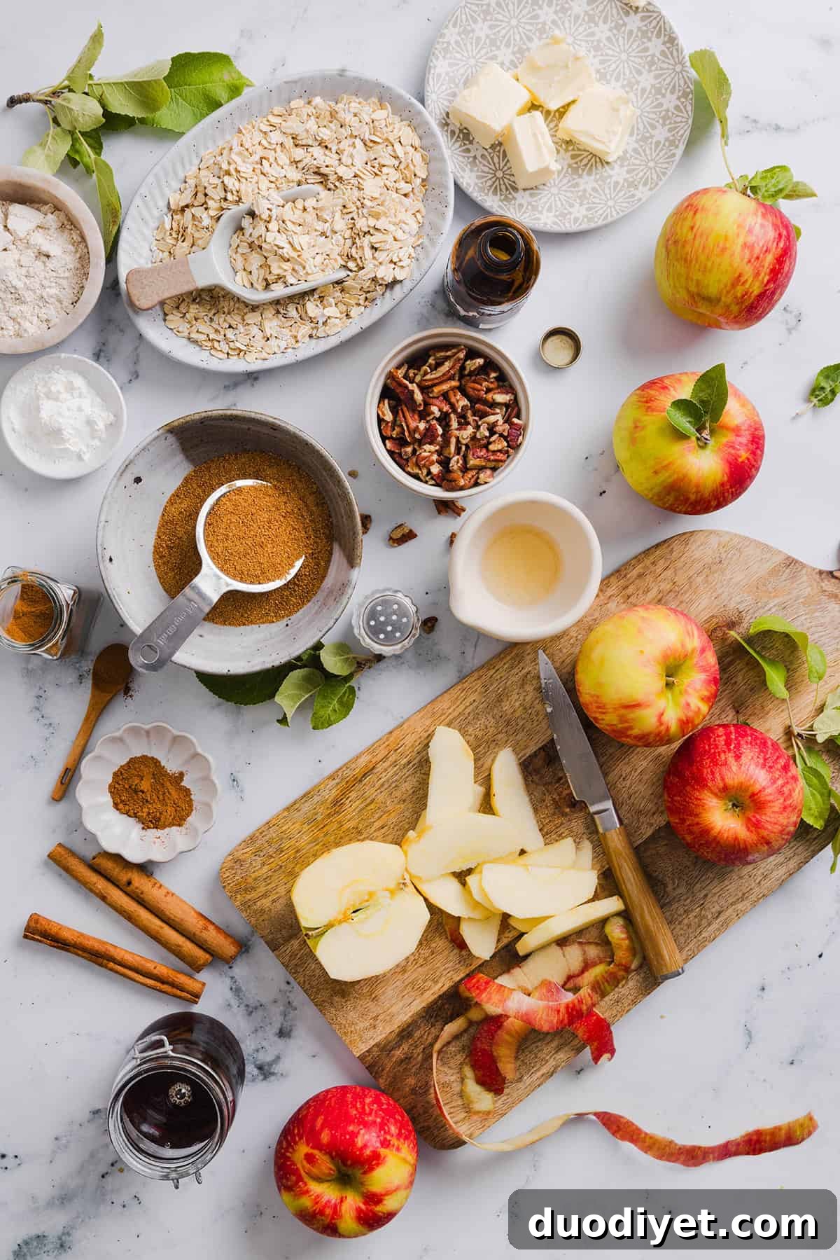 This Healthy Apple Crisp is loaded with tender apples and warm spices, naturally sweetened with maple syrup, all topped with a crunchy oatmeal pecan topping for the perfect fall dessert!