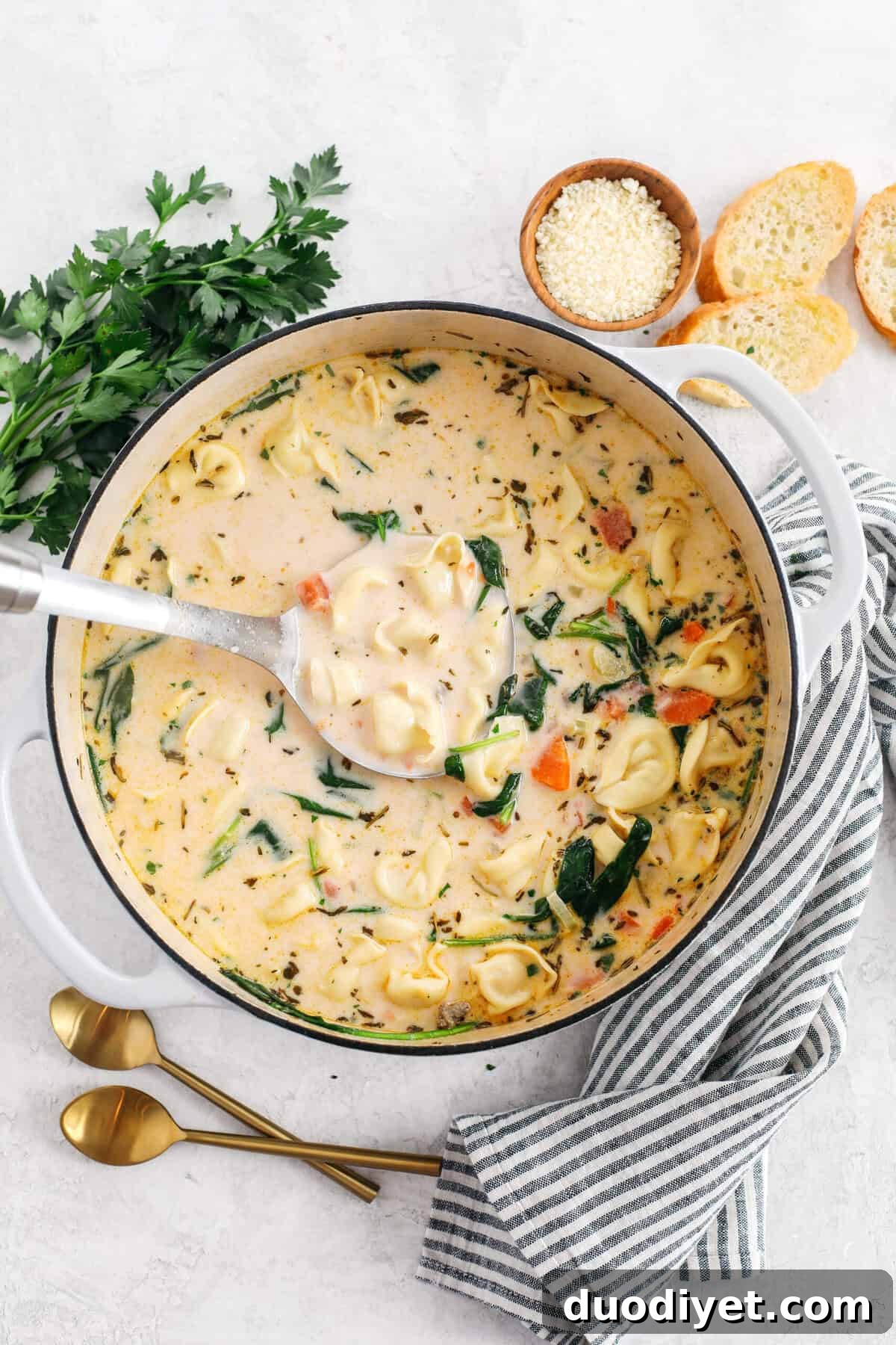 Creamy Sausage, Spinach and Tortellini Soup 4 This Creamy Sausage & Spinach Tortellini Soup is delicious, loaded with veggies and makes the perfect cozy meal that can easily be made in your instant pot, slow cooker or right on the stove!