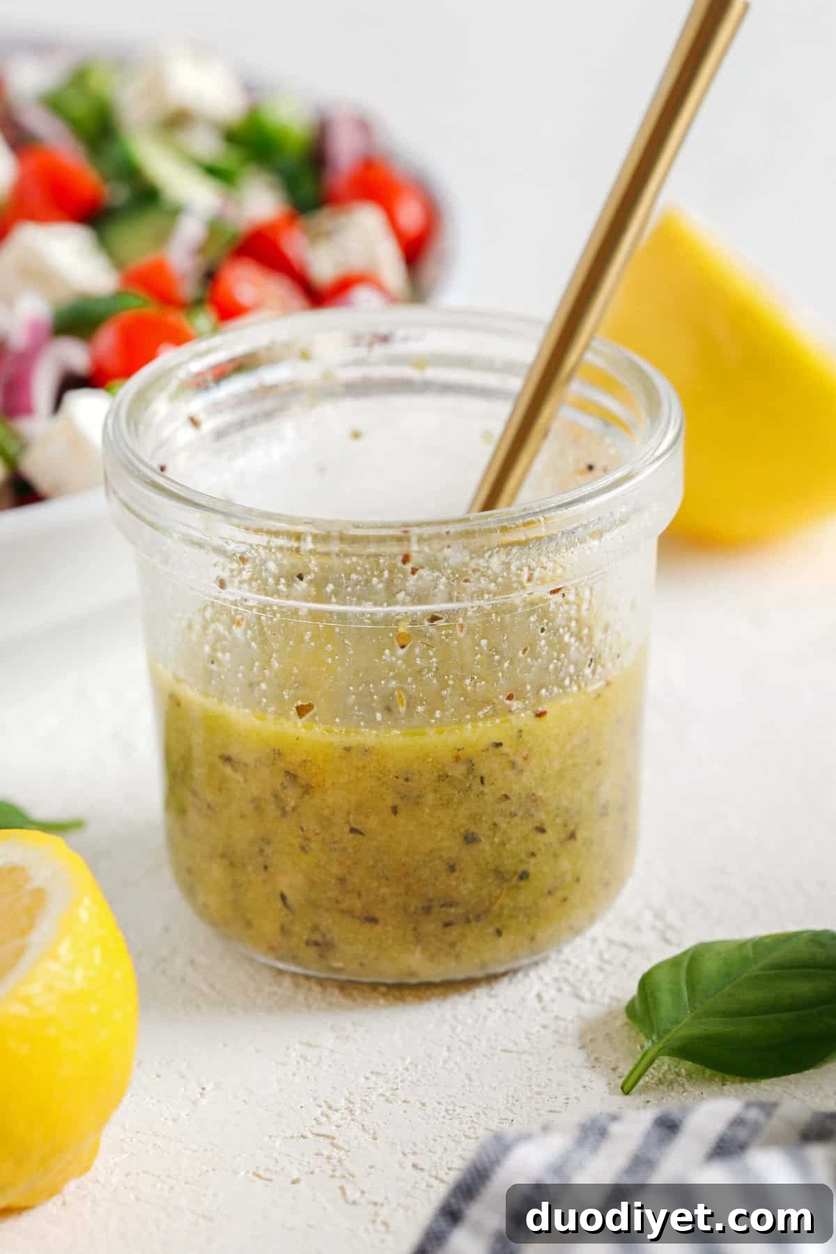 The most delicious homemade Greek Salad Dressing made with simple pantry ingredients perfect over salads, veggies, used as a marinade, pasta salads and more!
