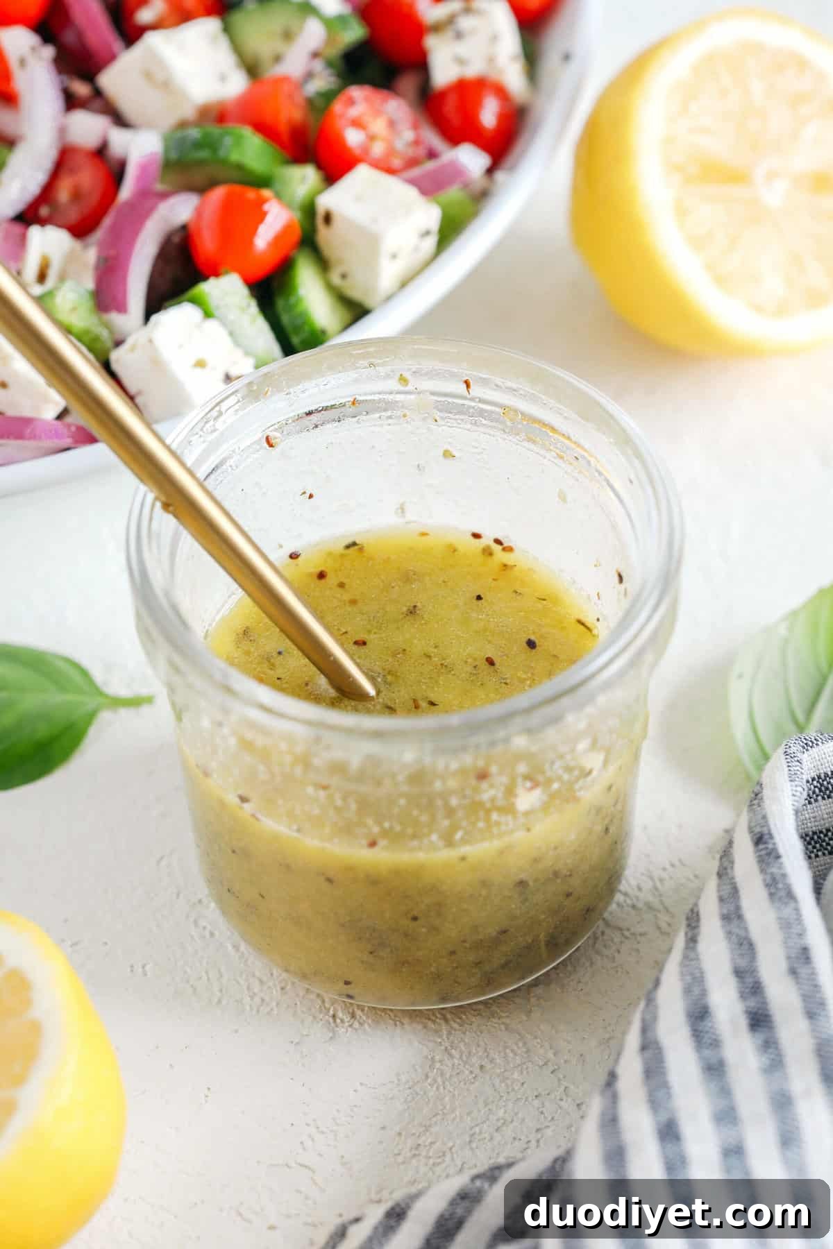 The most delicious homemade Greek Salad Dressing made with simple pantry ingredients perfect over salads, veggies, used as a marinade, pasta salads and more!