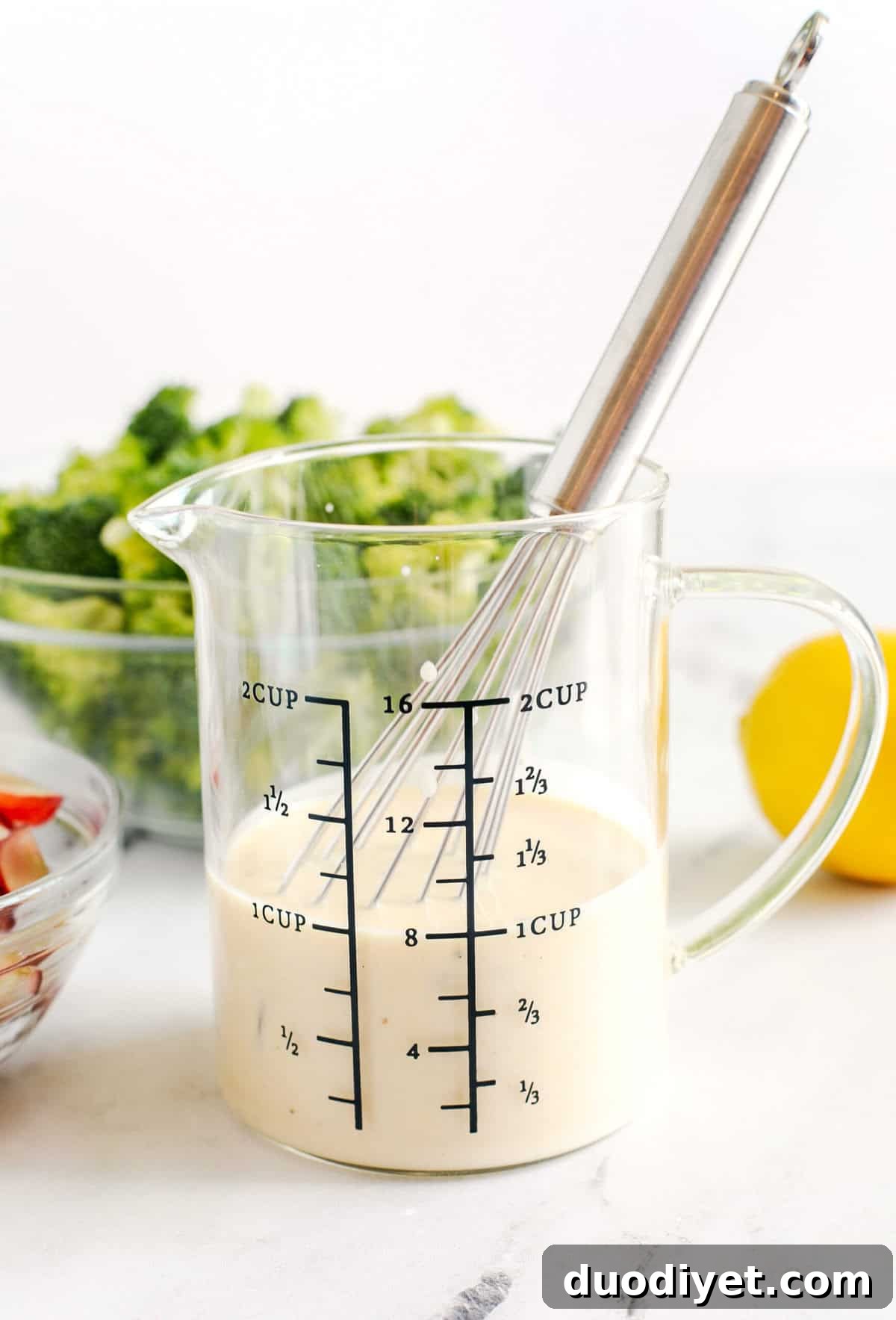Crunchy Broccoli Salad Recipe for Picnics and Potlucks 4 Bowl of healthy broccoli grape salad with yogurt-based dressing