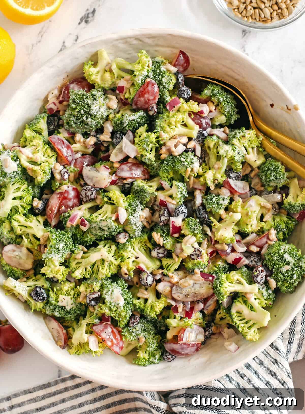 Crunchy Broccoli Salad Recipe for Picnics and Potlucks 5 Healthy broccoli salad with grapes, raisins and sunflower seeds