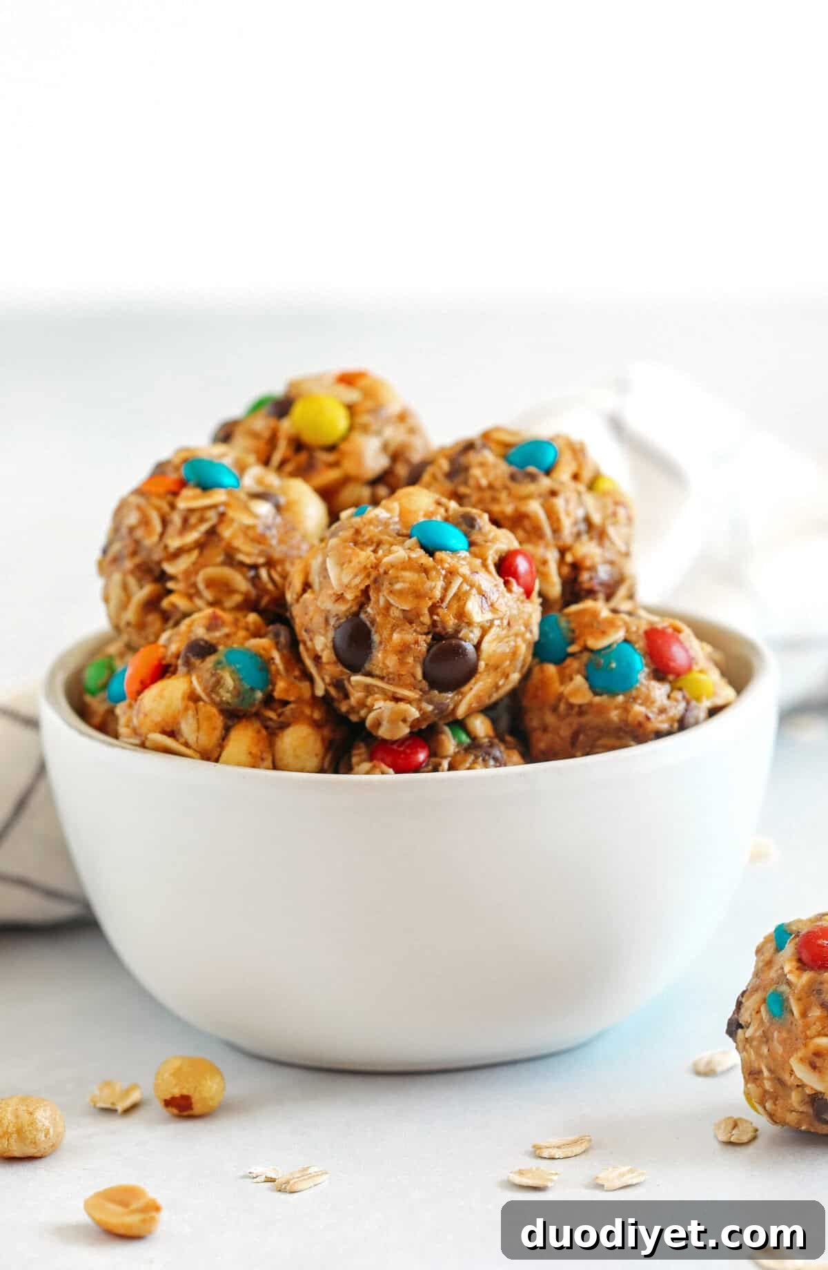 No-Bake Peanut Butter Trail Mix Bites 2 Delicious Peanut Butter Trail Mix Balls easily made in just 15 minutes with a few simple ingredients! Perfect back-to-school snack that your kids will love!