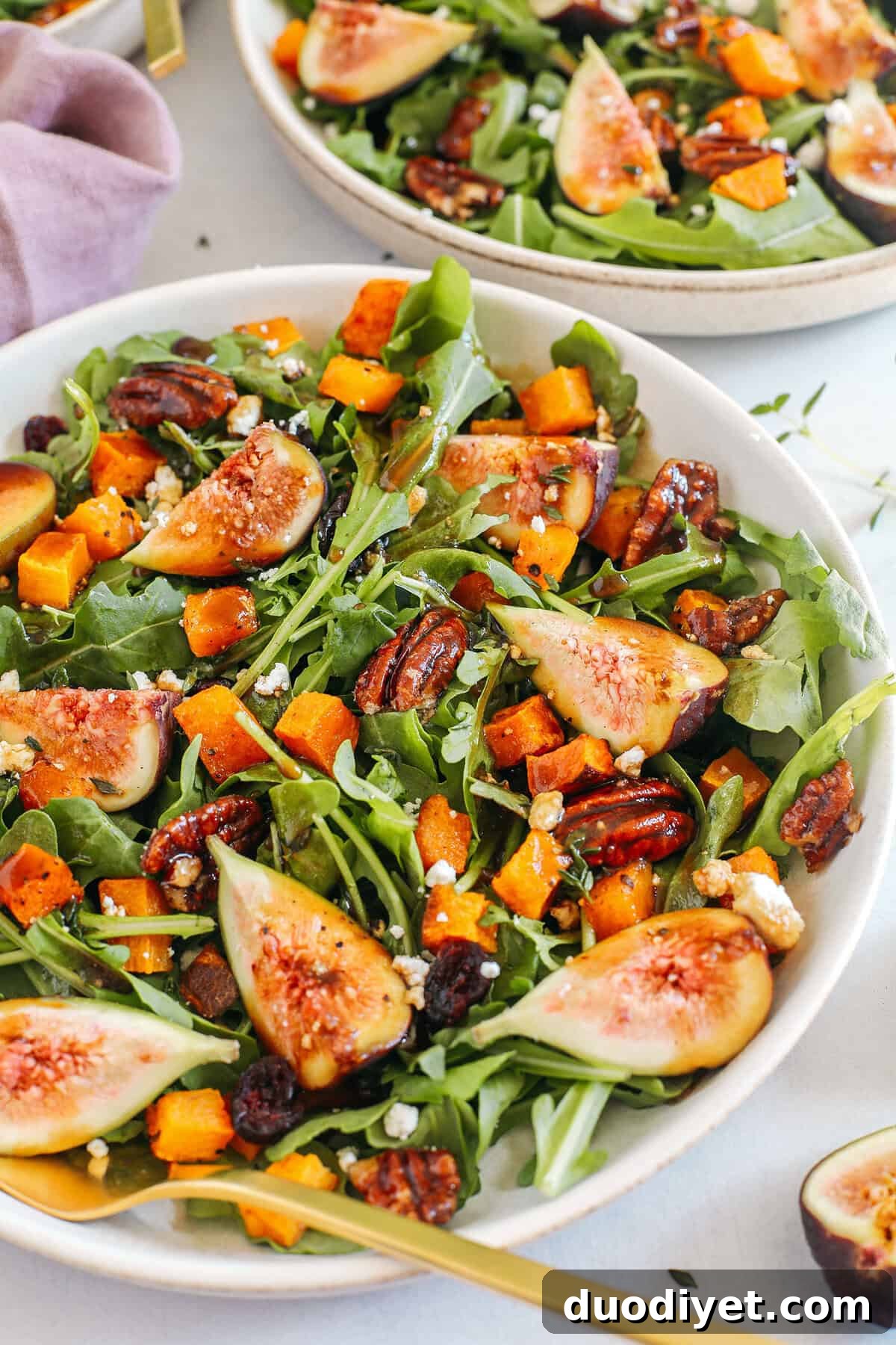 Roasted Butternut Squash and Fig Salad 5 This Fig Salad with Roasted Butternut Squash is the perfect fall salad loaded with leafy greens, fresh figs, candied pecans, and creamy goat cheese all tossed with a rich balsamic dressing!