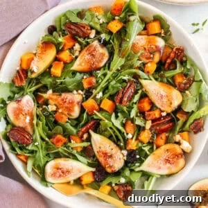 This Fig Salad with Roasted Butternut Squash is the perfect fall salad loaded with leafy greens, fresh figs, crunchy pecans, and creamy goat cheese all tossed with a rich balsamic dressing!