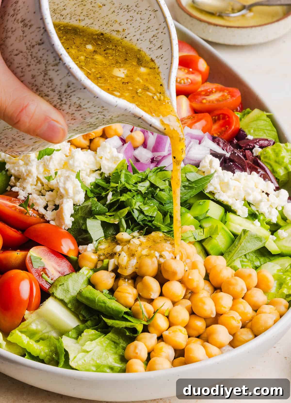Mediterranean Chopped Salad with Feta, Olives and Lemon Dressing 4 Fresh and crisp Mediterranean Chopped Salad made with fresh tomatoes, crisp cucumbers, red onion, chickpeas, olives and feta cheese all tossed with a delicious red wine vinaigrette! Perfect for meal prep, lunches, or an easy side dish for any meal.