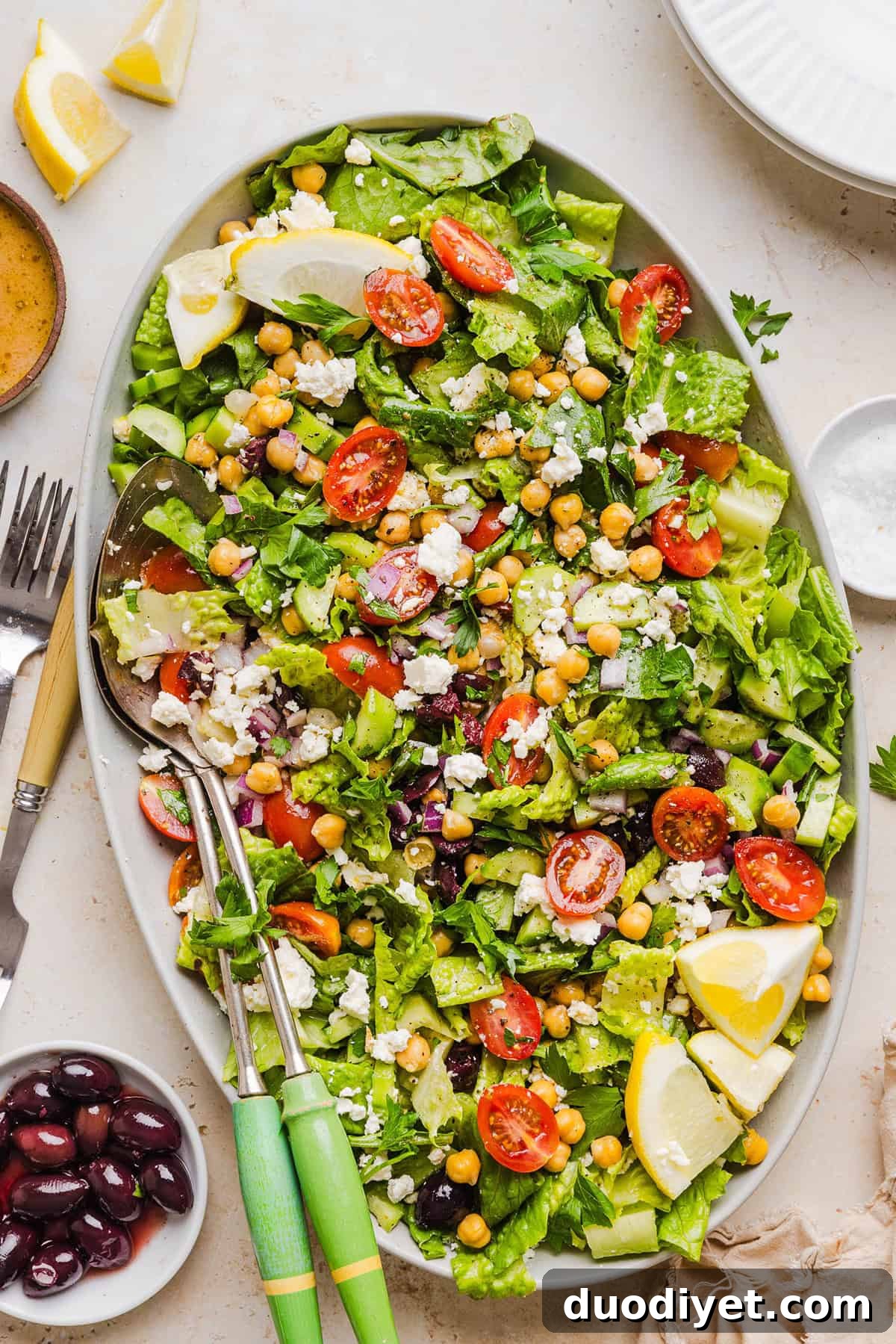 Mediterranean Chopped Salad with Feta, Olives and Lemon Dressing 5 Fresh and crisp Mediterranean Chopped Salad made with fresh tomatoes, crisp cucumbers, red onion, chickpeas, olives and feta cheese all tossed with a delicious red wine vinaigrette! Perfect for meal prep, lunches, or an easy side dish for any meal.