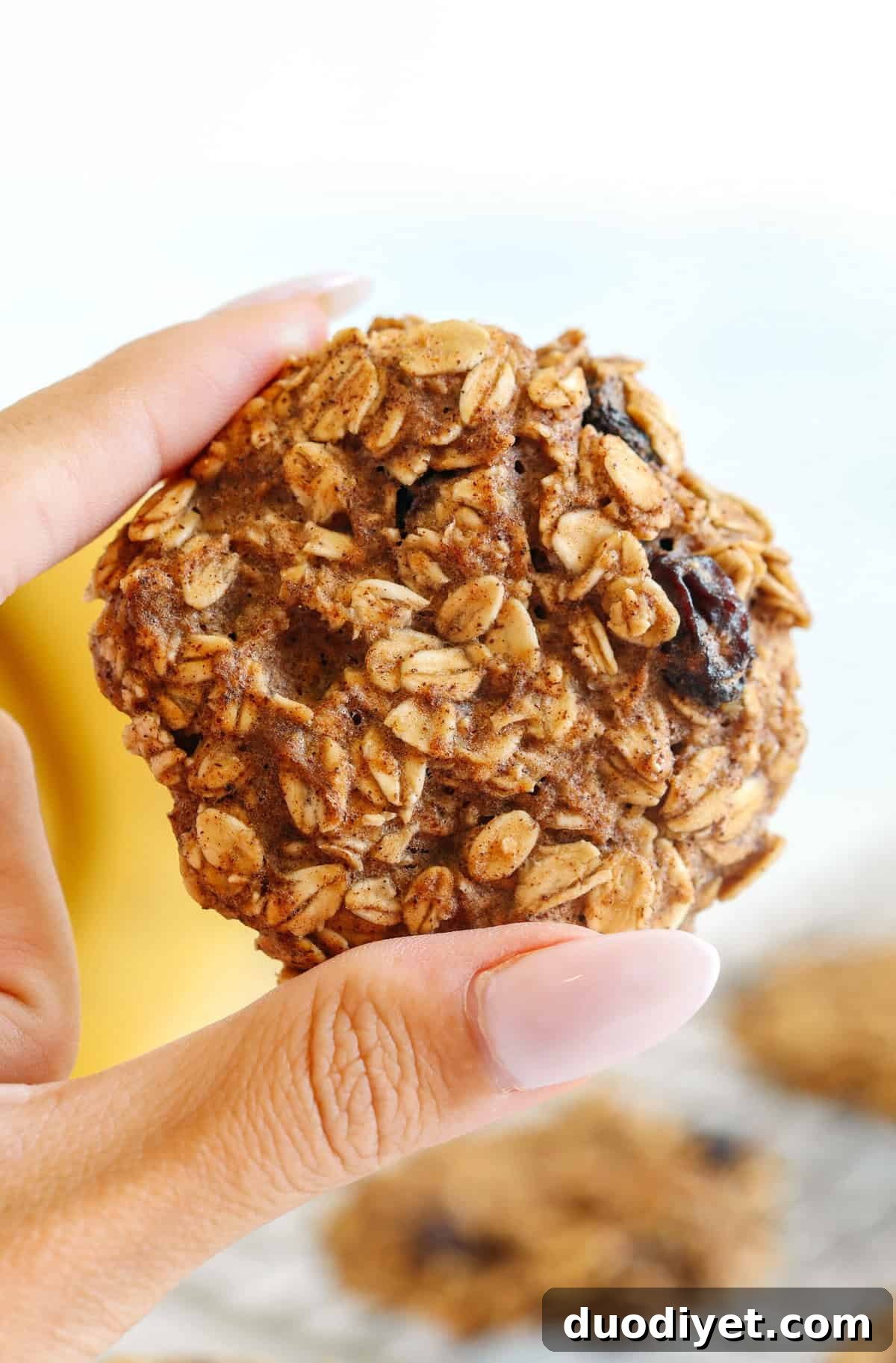 Freshly baked banana oatmeal breakfast cookies cooling on a rack