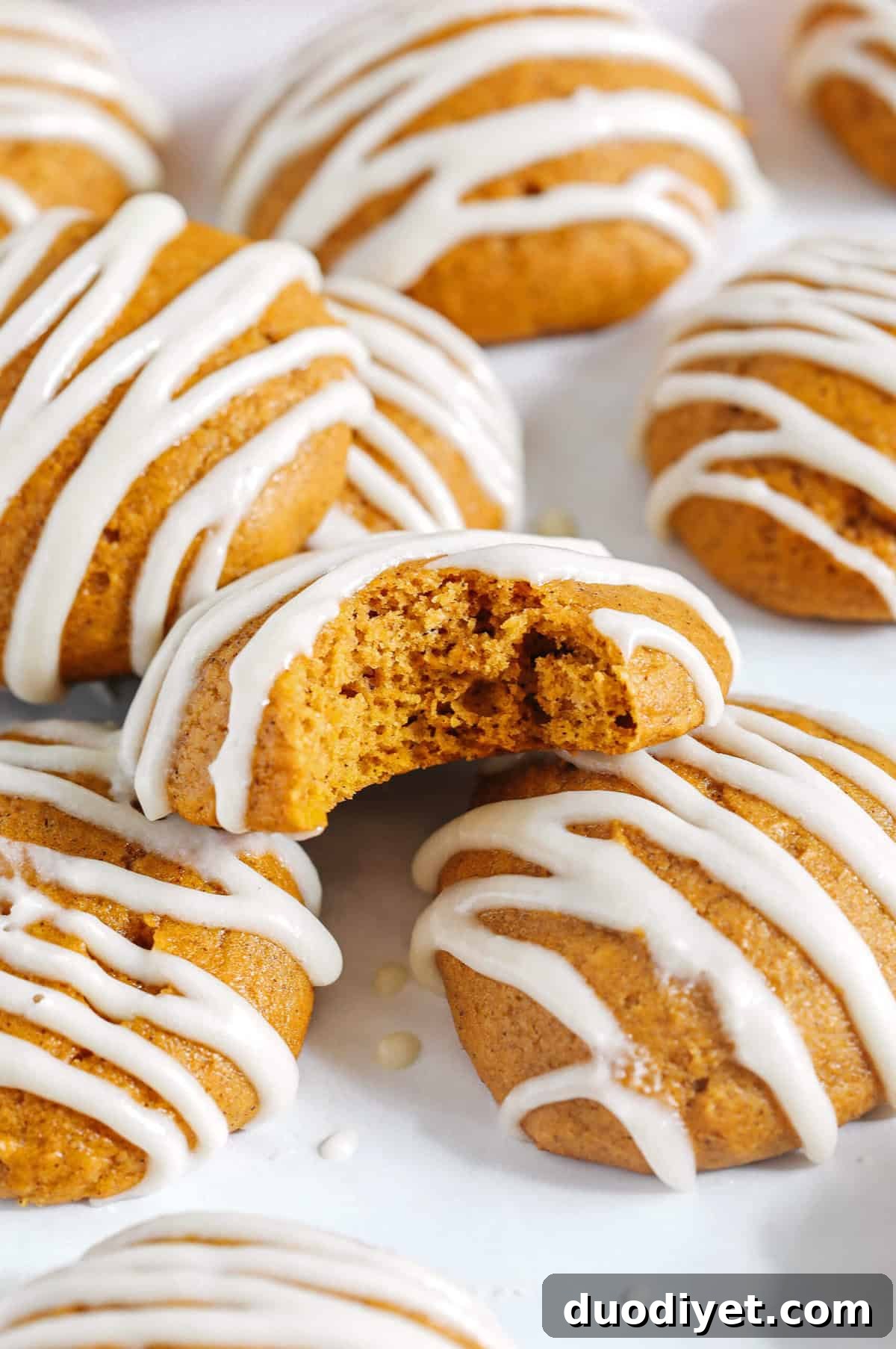 Soft Frosted Pumpkin Cookies Recipe 4 Pillowy soft Iced Pumpkin Cookies made healthier with whole wheat flour and zero butter or refined sugar all drizzled with a delicious maple cream cheese icing! These cake-like pumpkin cookies make the perfect fall treat to enjoy this season.