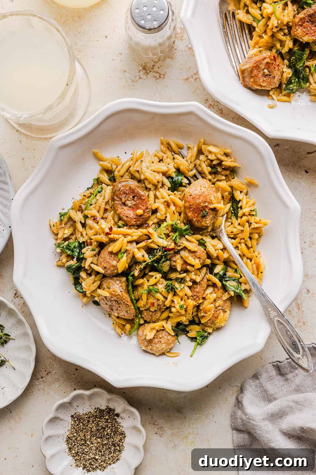 One-Pan Creamy Chicken and Sausage Orzo Skillet Recipe 8 Close up of creamy orzo and sausage