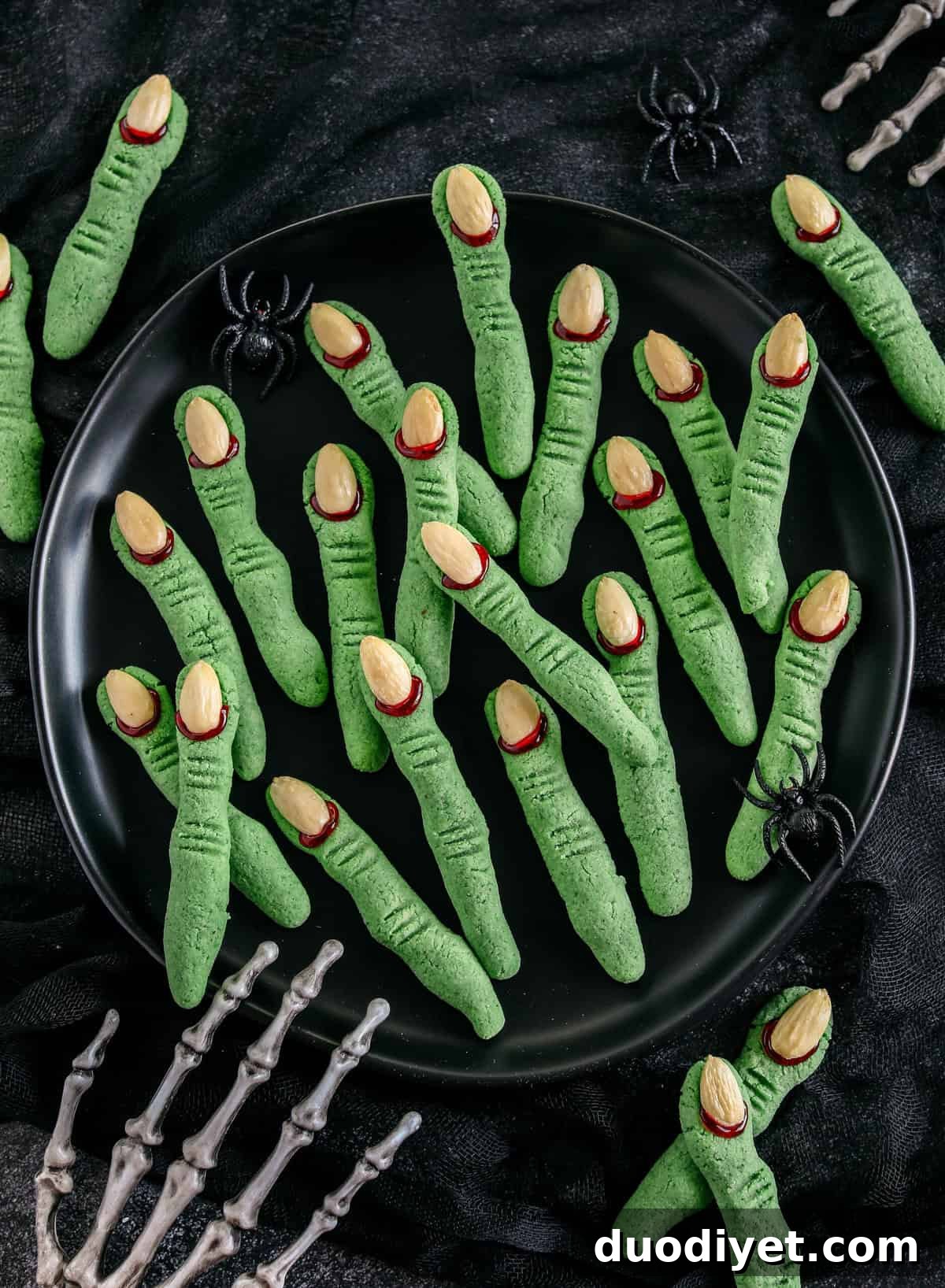Festive gluten-free Spooky Witch Finger Cookies made healthier with almond flour and zero oil or refined sugar that make the perfect addition to your Halloween party! Tasty almond flavored cookies that are simple and fun to make!