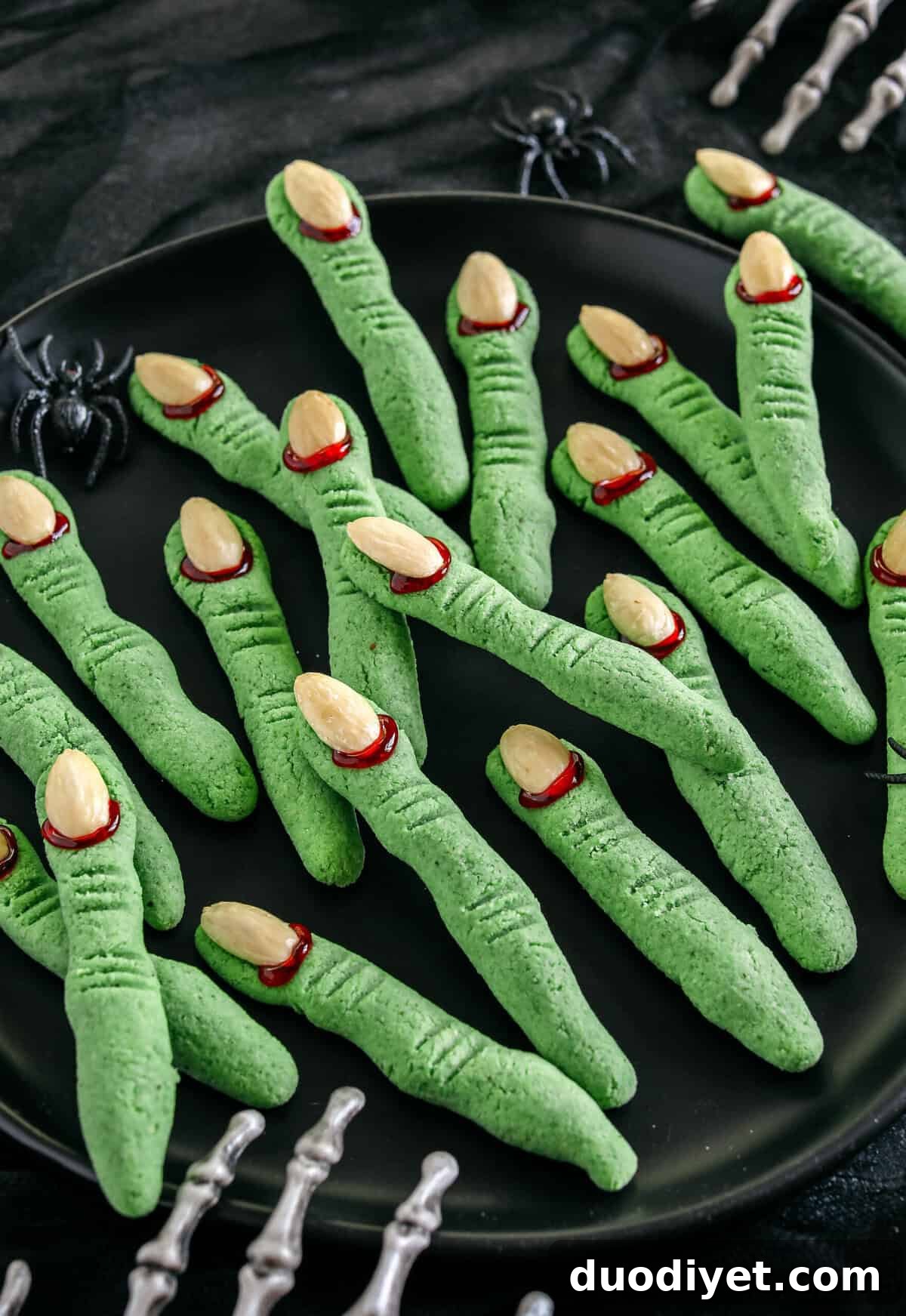 Festive gluten-free Spooky Witch Finger Cookies made healthier with almond flour and zero oil or refined sugar that make the perfect addition to your Halloween party! Tasty almond flavored cookies that are simple and fun to make!