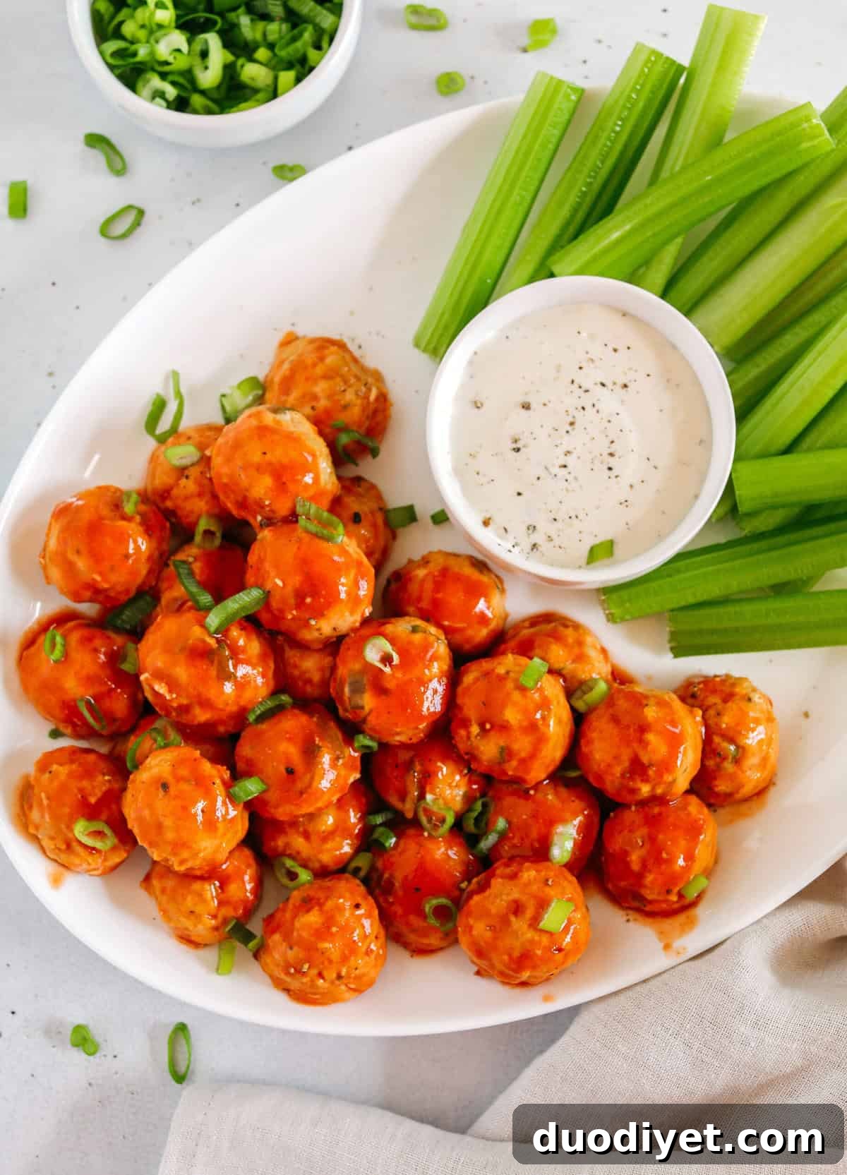 These Buffalo Chicken Meatballs make the perfect party appetizer, game day snack or healthy weeknight dinner!