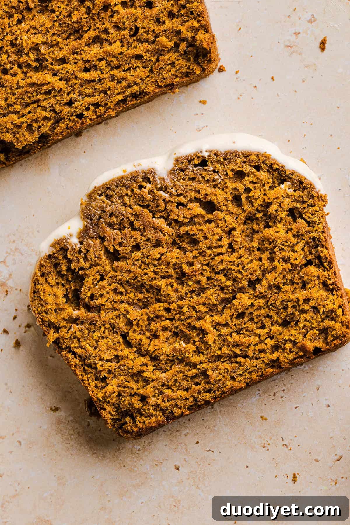 Moist Pumpkin Bread Recipe - Low Sugar, Whole Grain 2 The BEST Healthy Pumpkin Bread that is moist, loaded with pumpkin flavor and made without any butter or refined sugar! Topped with a delicious maple cream cheese glaze for the perfect fall treat this season!