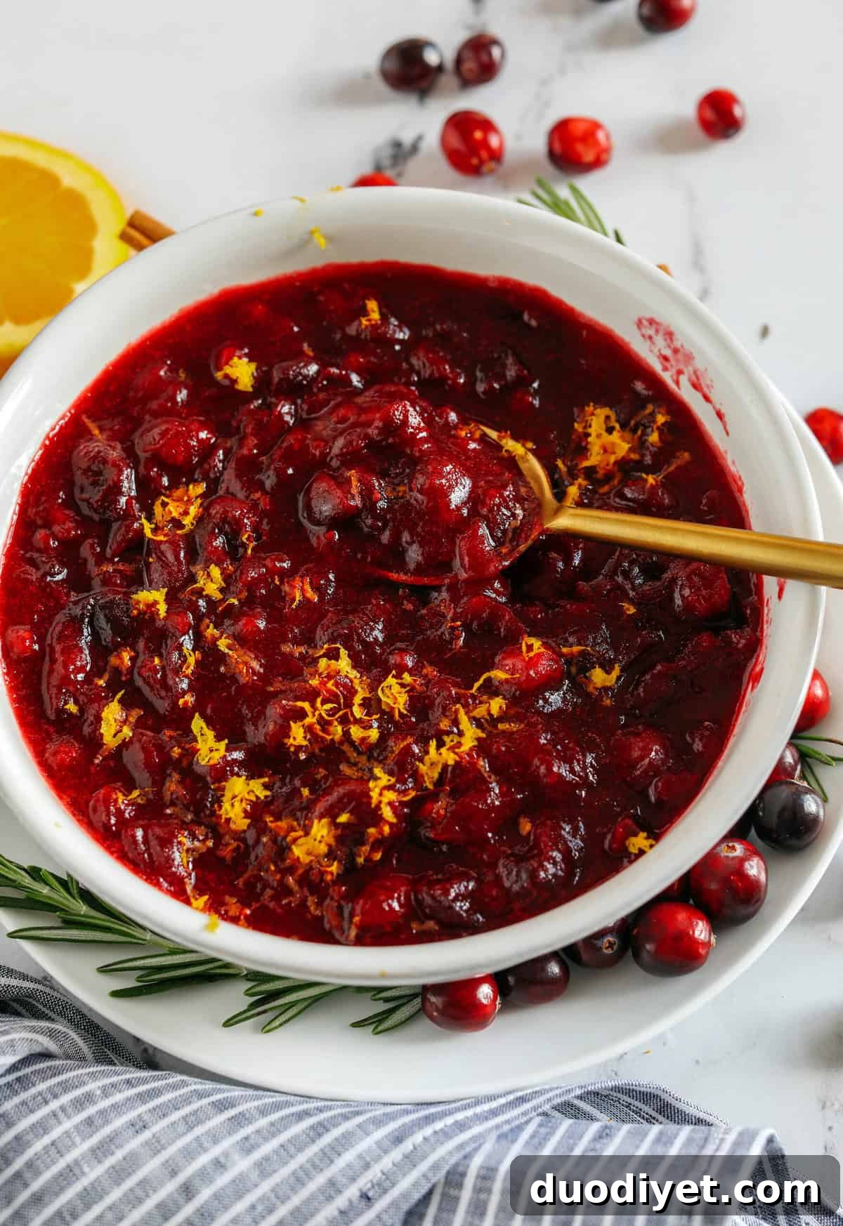 This Healthy Cranberry Sauce is naturally sweetened made with maple syrup, fresh orange juice, cinnamon, ginger and deep rich flavors from a little port wine. Sweet, tangy and the perfect addition to your Thanksgiving and Christmas table this season!