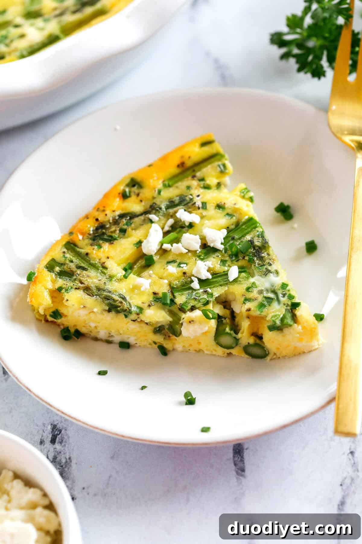 Crustless Asparagus and Feta Quiche Recipe 4 Fresh herbs and a slice of crustless quiche