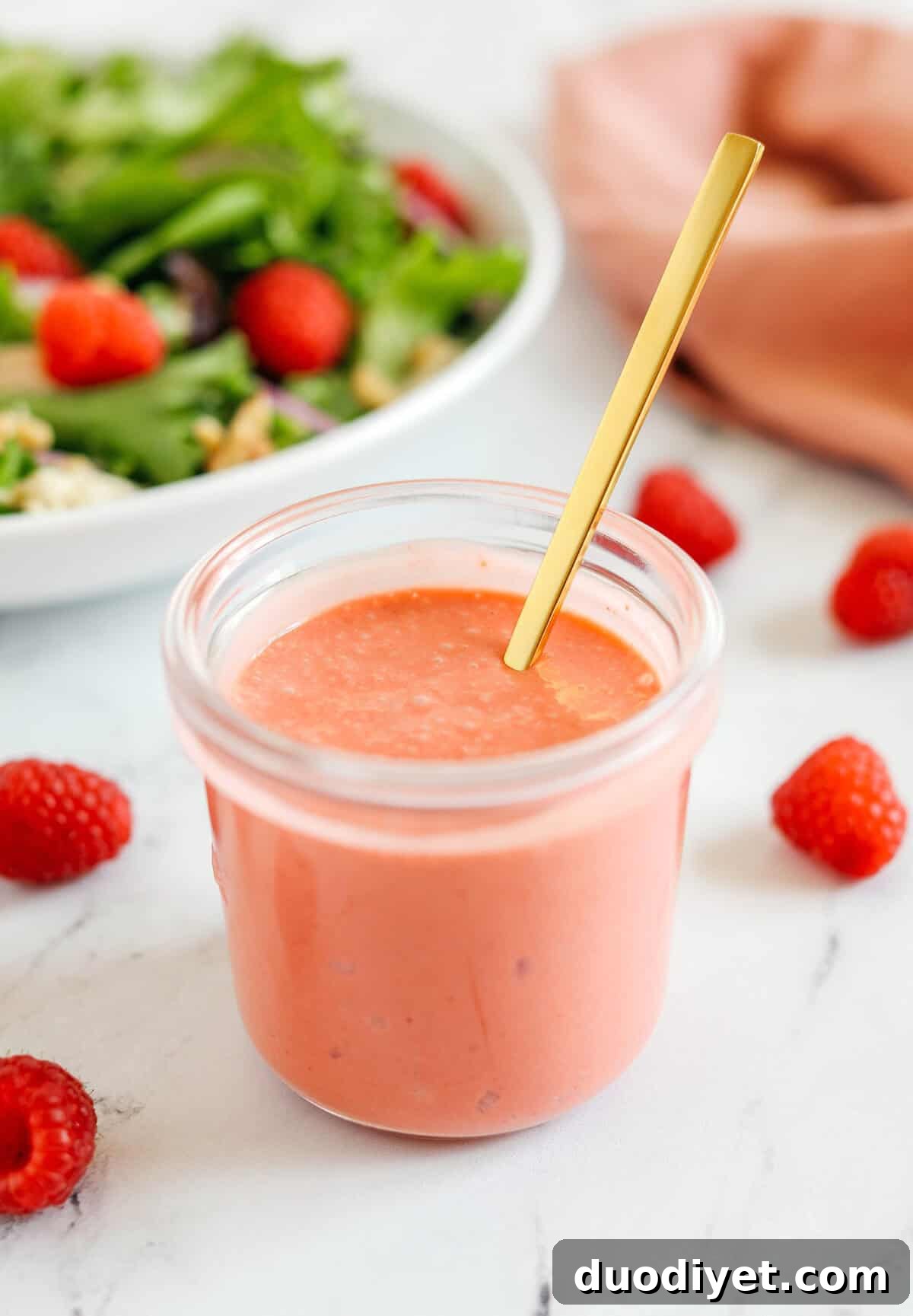 Raspberry Vinaigrette Dressing Recipe 3 Raspberry vinaigrette poured over salad