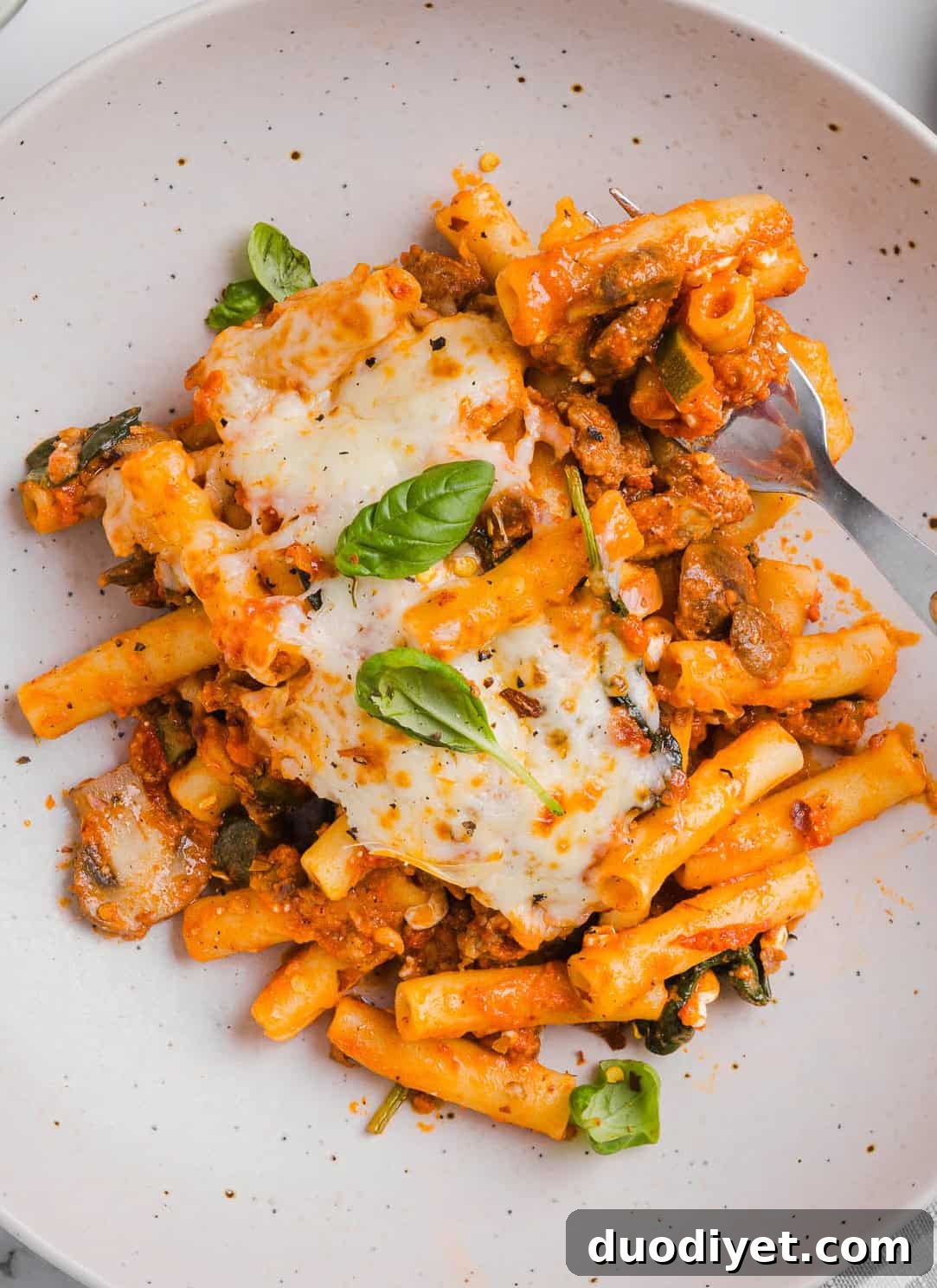 Wholesome Baked Ziti Recipe with Spinach and Ricotta 6 Comforting and delicious Healthy Baked Ziti packed with veggies, flavorful turkey sausage and makes the perfect weeknight meal the whole family will love! Leftovers guaranteed!