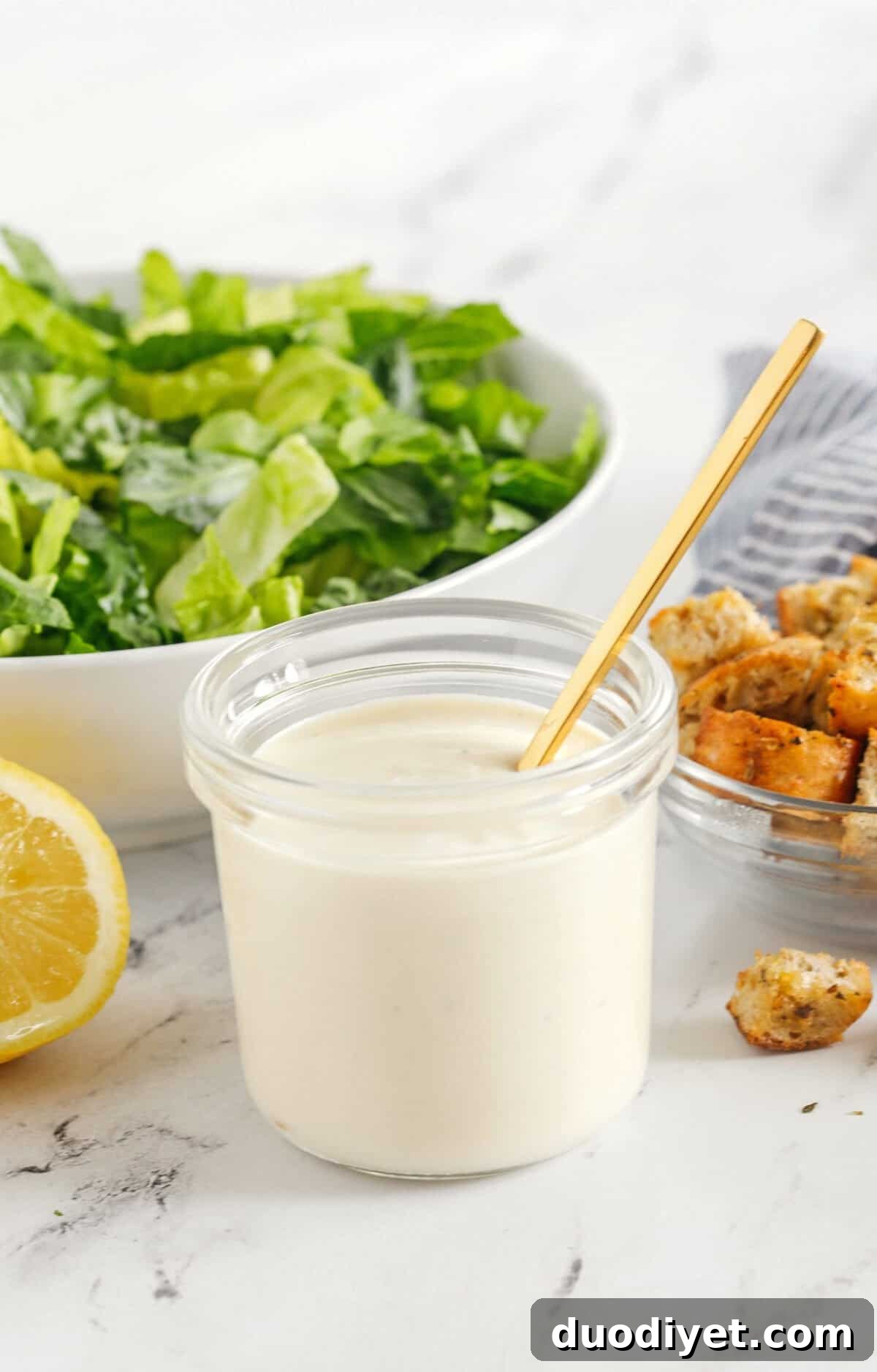 Rich and creamy Healthy Caesar Dressing made with protein-packed Greek yogurt for a lighter take on this classic dressing! Homemade is always better than store-bought!
