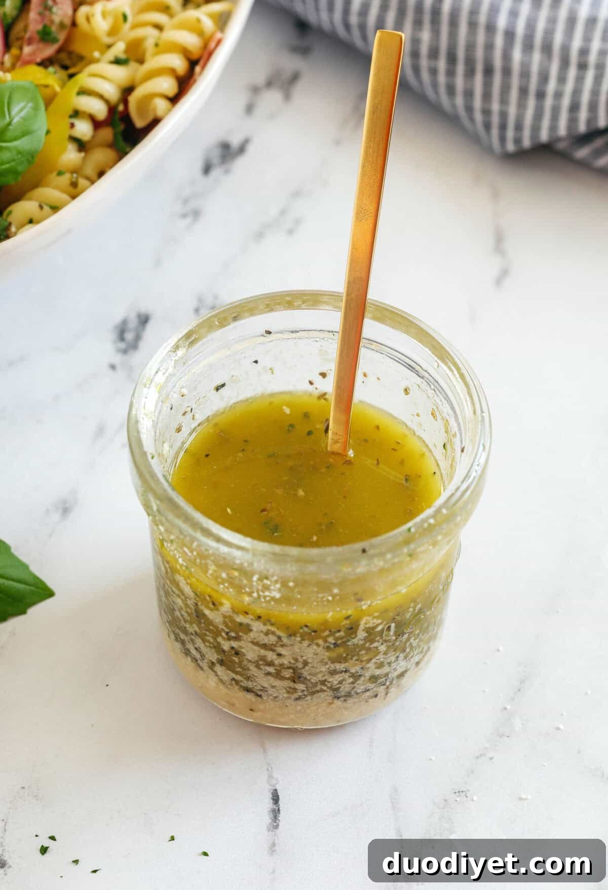 Bowl of homemade Italian dressing with parmesan