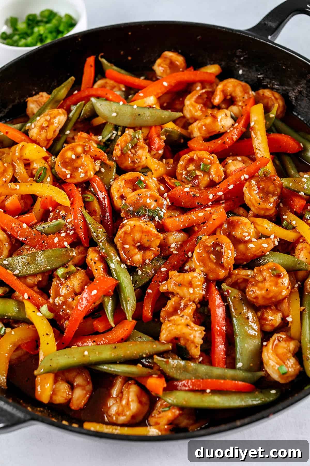 Spicy Firecracker Shrimp Stir-Fry Recipe 2 This Easy Firecracker Shrimp Stir Fry is the perfect weeknight meal with tender shrimp, crisp vegetables, all smothered in a sweet and spicy sauce that tastes way better than take-out! Serve over rice and have dinner on your table in under 20 minutes.
