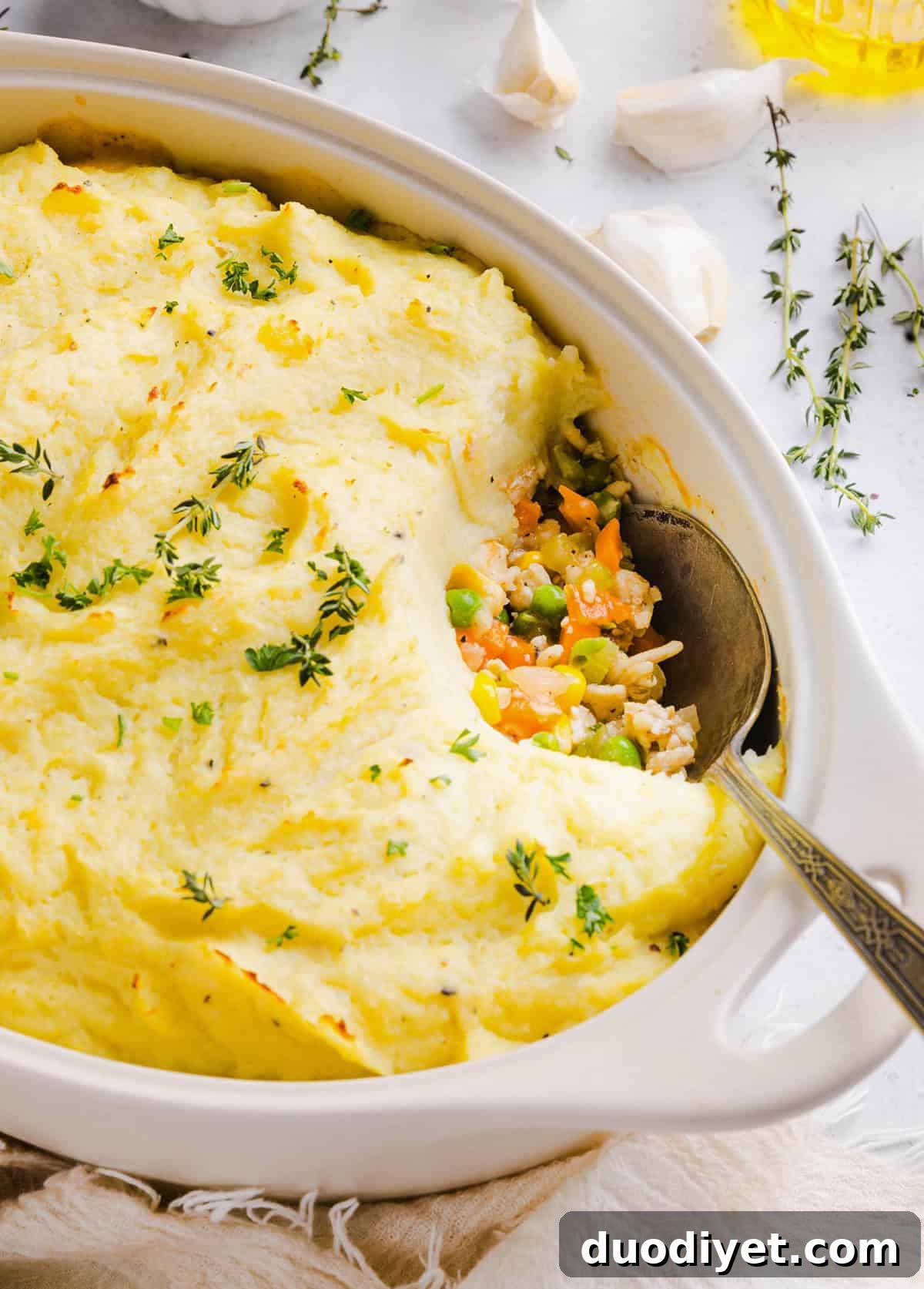 Turkey Shepherd's Pie with Mashed Potato and Veggies 7 Slice of turkey shepherd's pie on a plate.