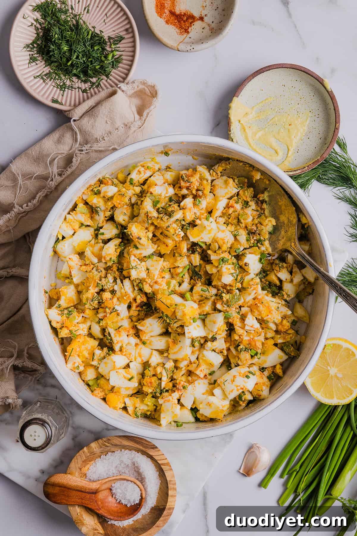 Meal-prepped jars of egg salad for the week