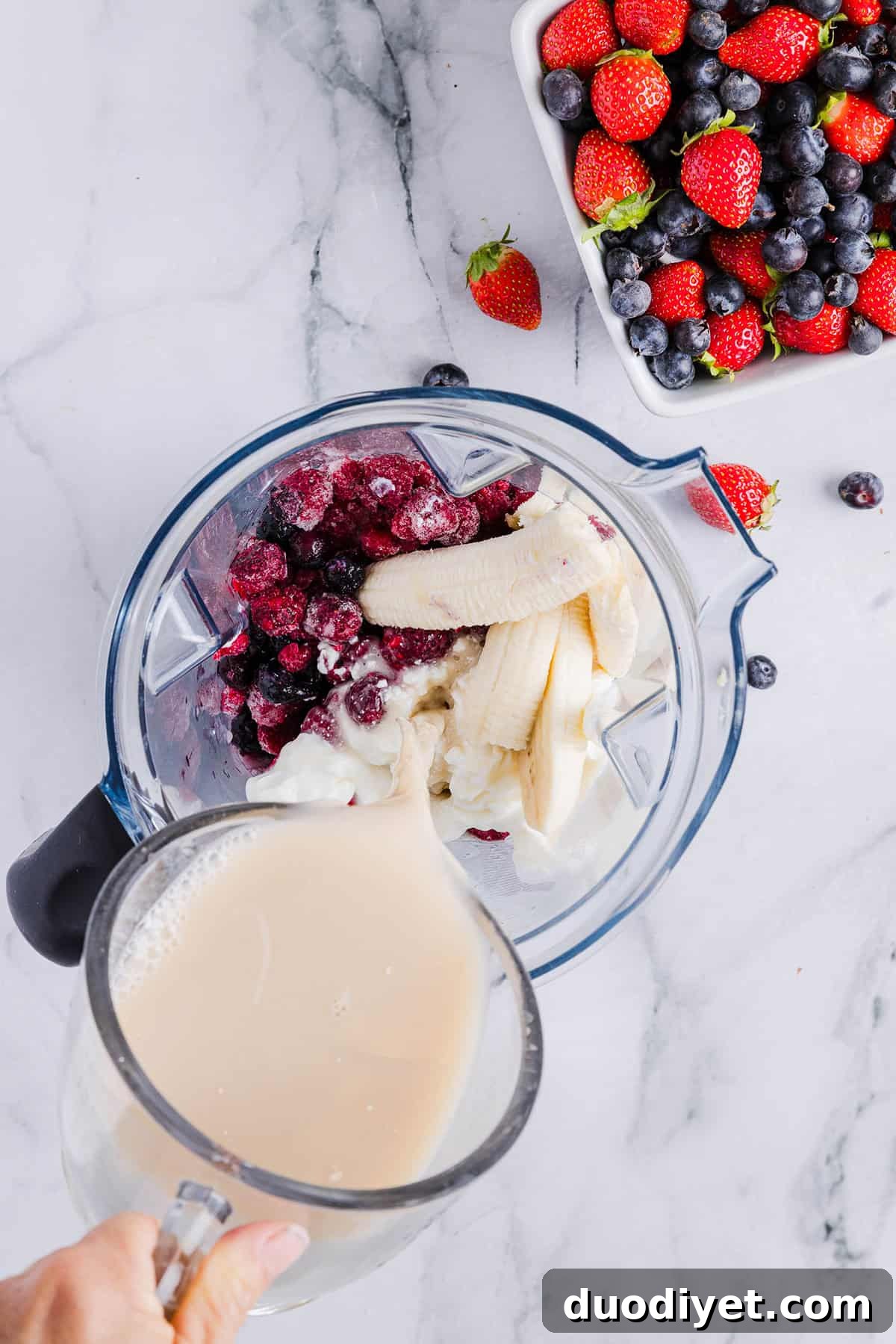 Creamy Mixed Berry Smoothie Recipe 4 Mixed berry ingredients ready to blend