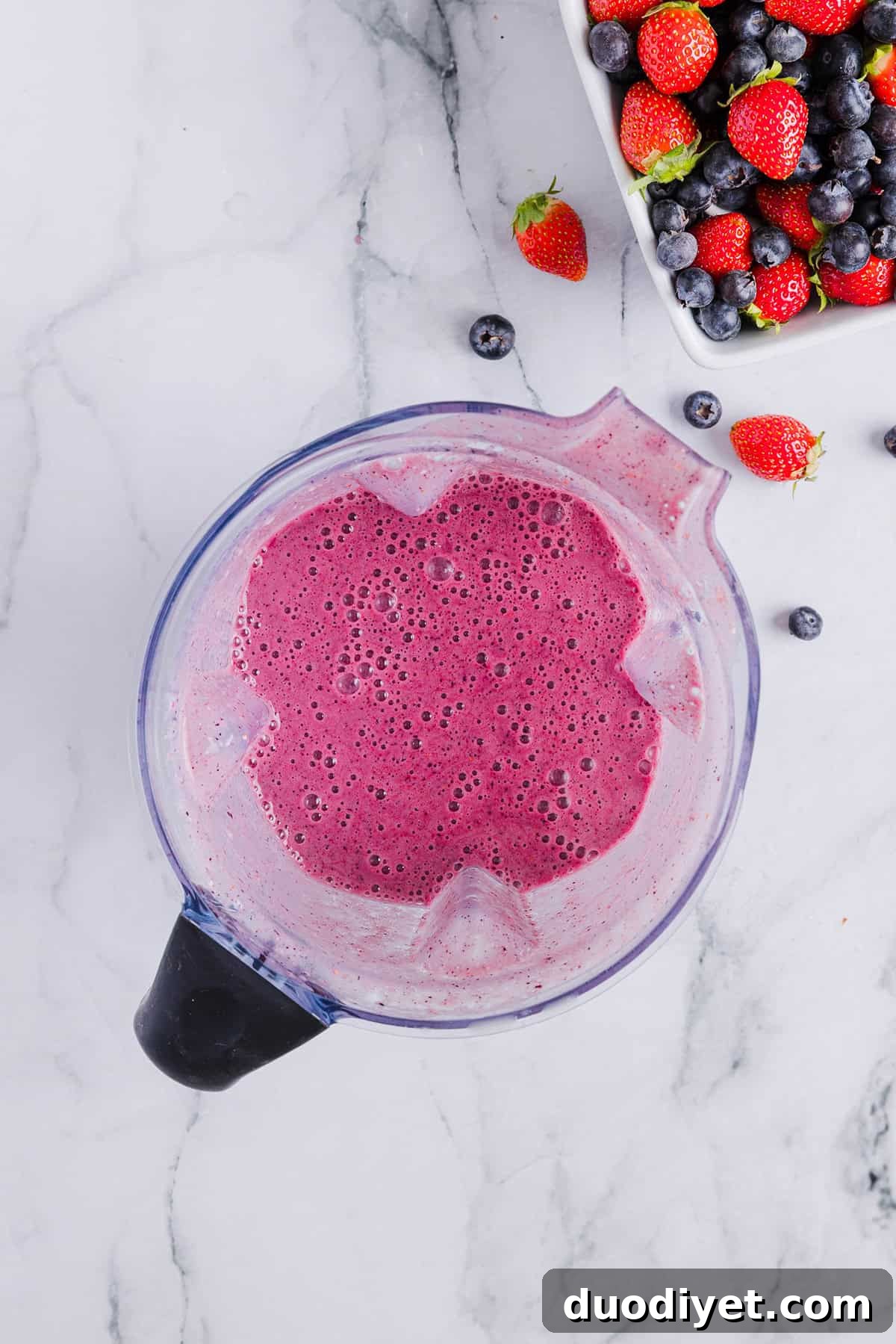 Creamy Mixed Berry Smoothie Recipe 5 Creamy mixed berry smoothie in jar