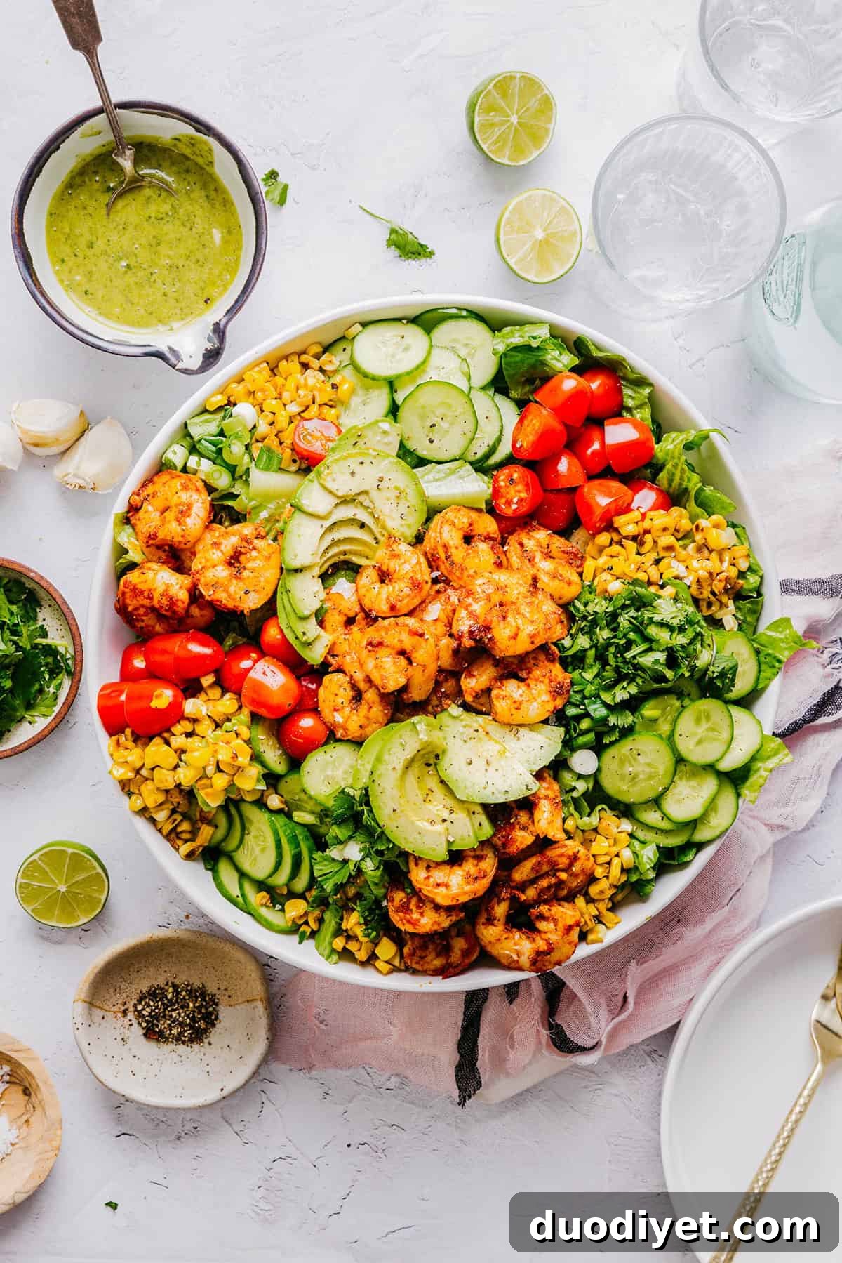 This Blackened Shrimp and Corn Salad is the perfect summer salad that is flavorful, filling and easily comes together in under 30 minutes! The cilantro lime dressing ties it all together with a bright, zesty finish!